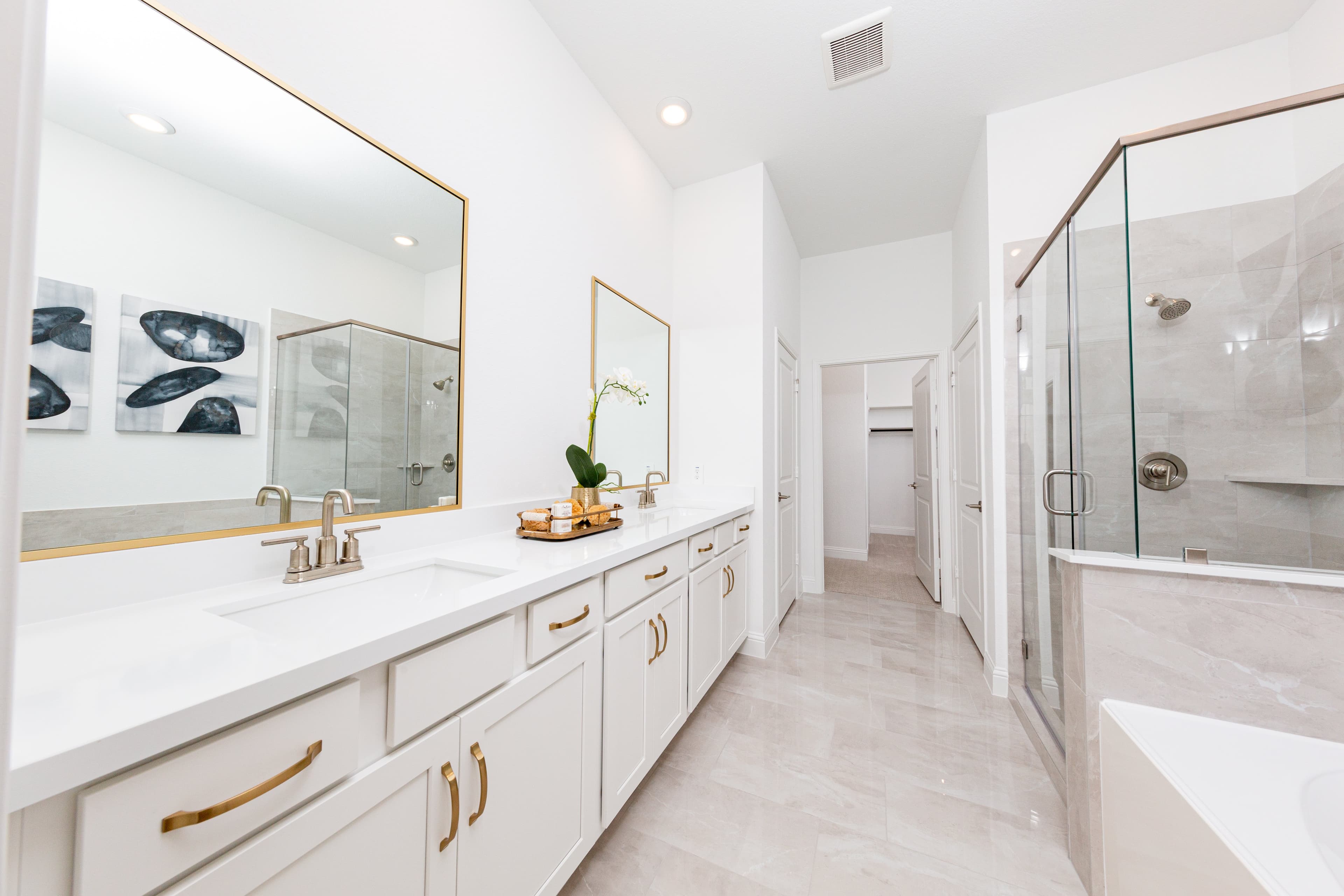 primary bathroom with soaking tub and shower