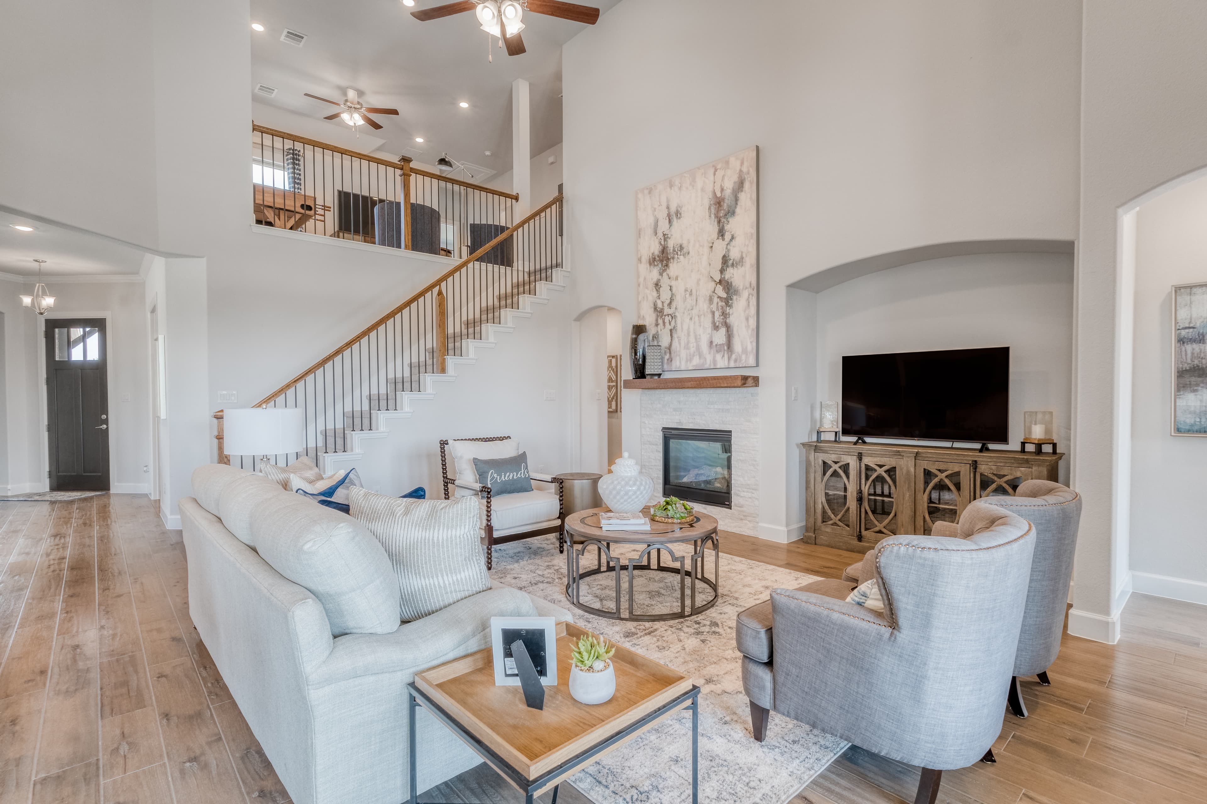 large great room with two-story ceiling