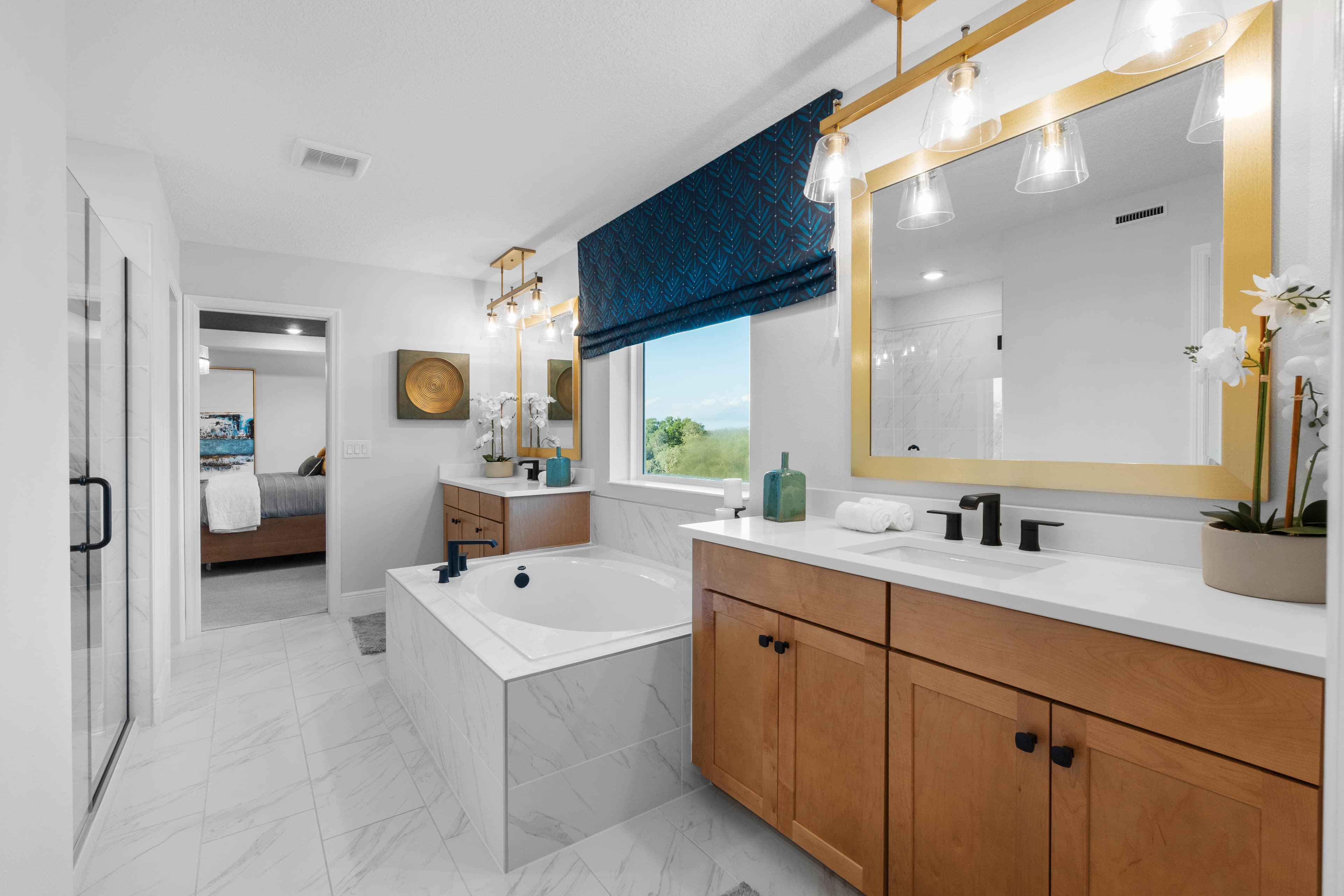 dual sink vanity with oversized tub and shower access