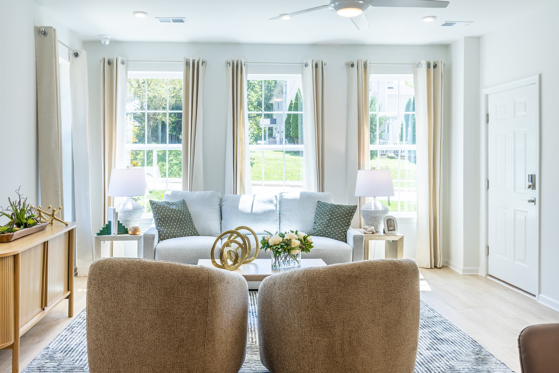 great room with 3 large windows