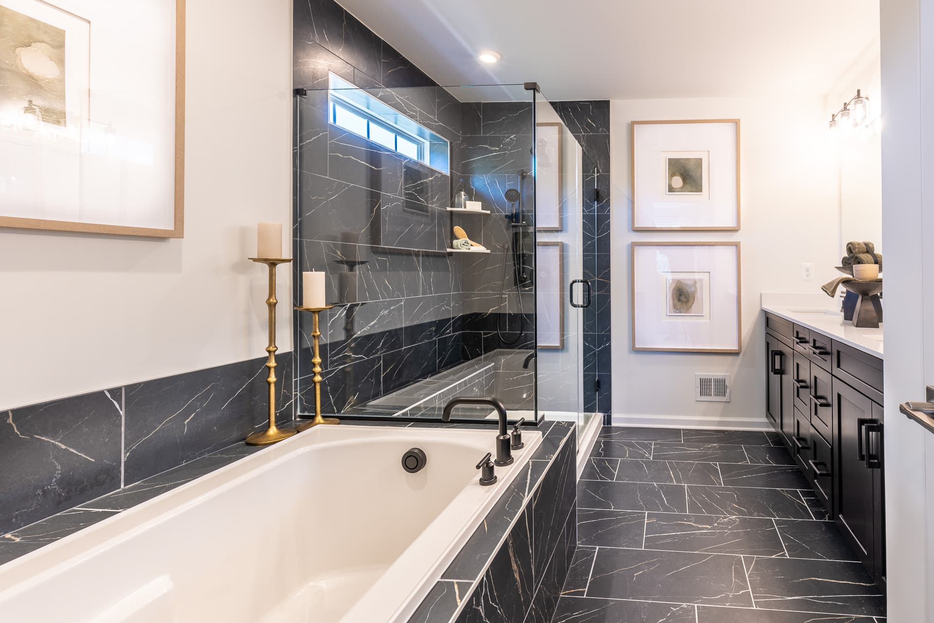 primary bath with a separate shower and soaking tub