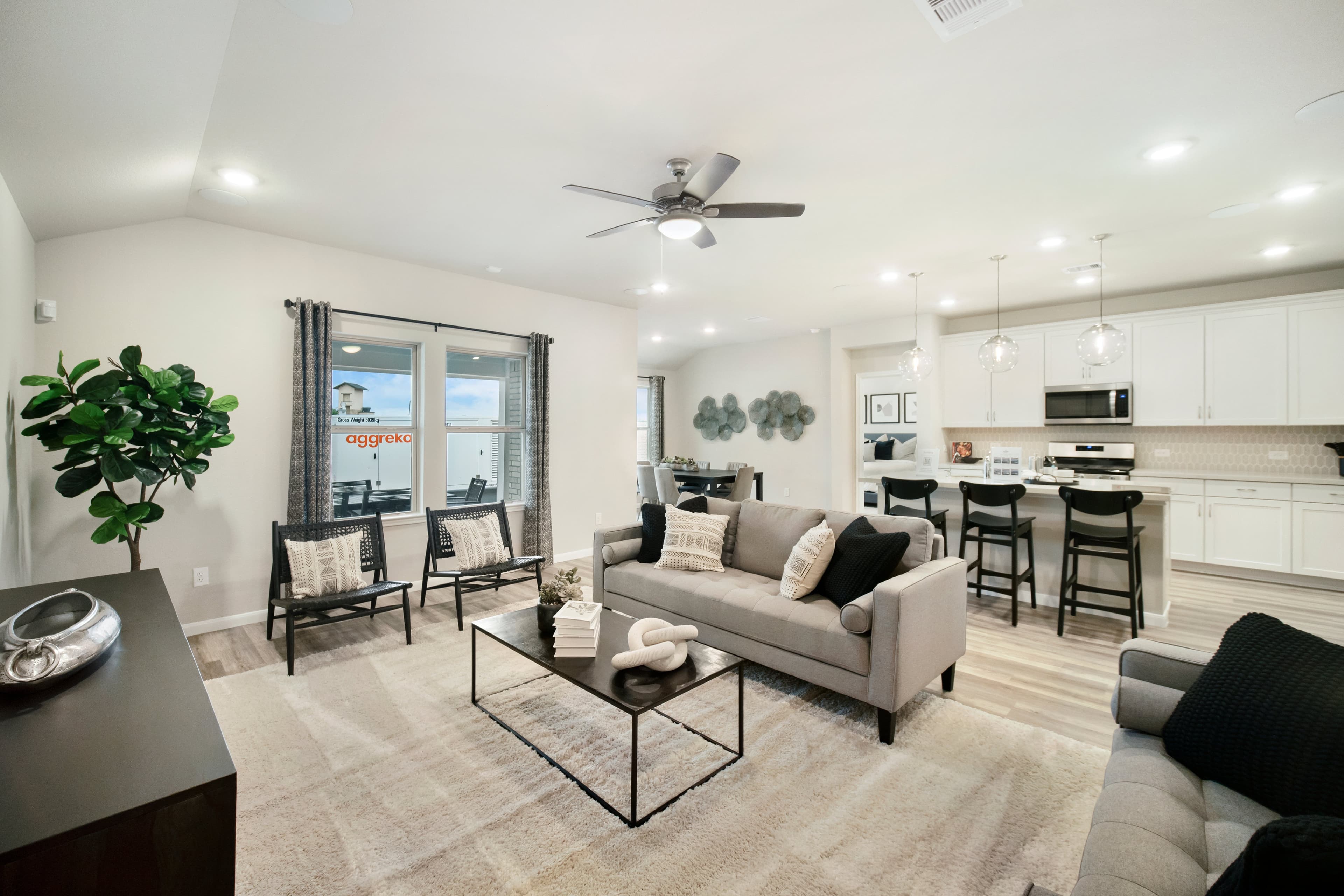 large great room with hardwood flooring