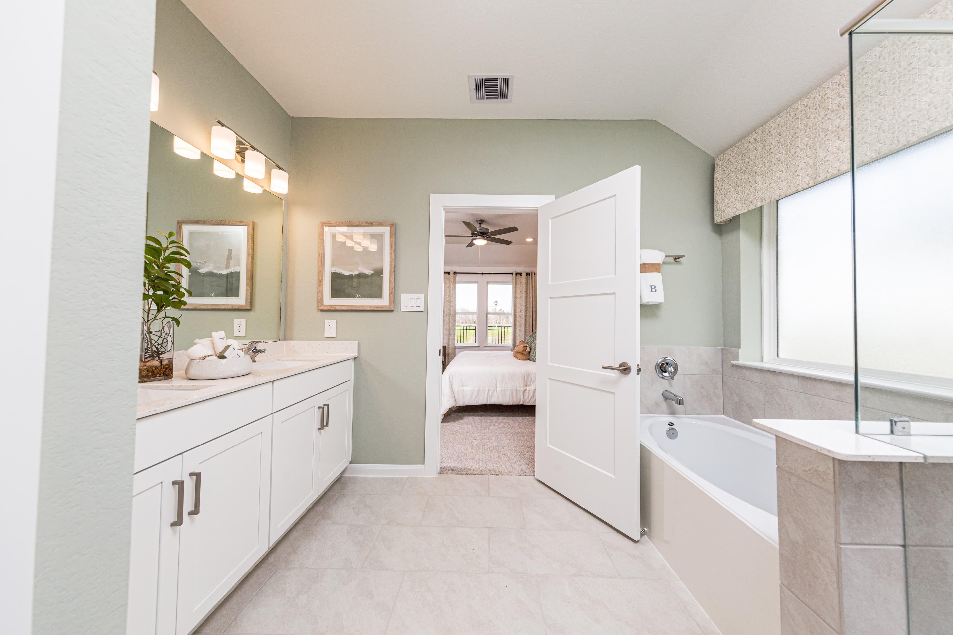 primary bathroom with soaking tub and shower