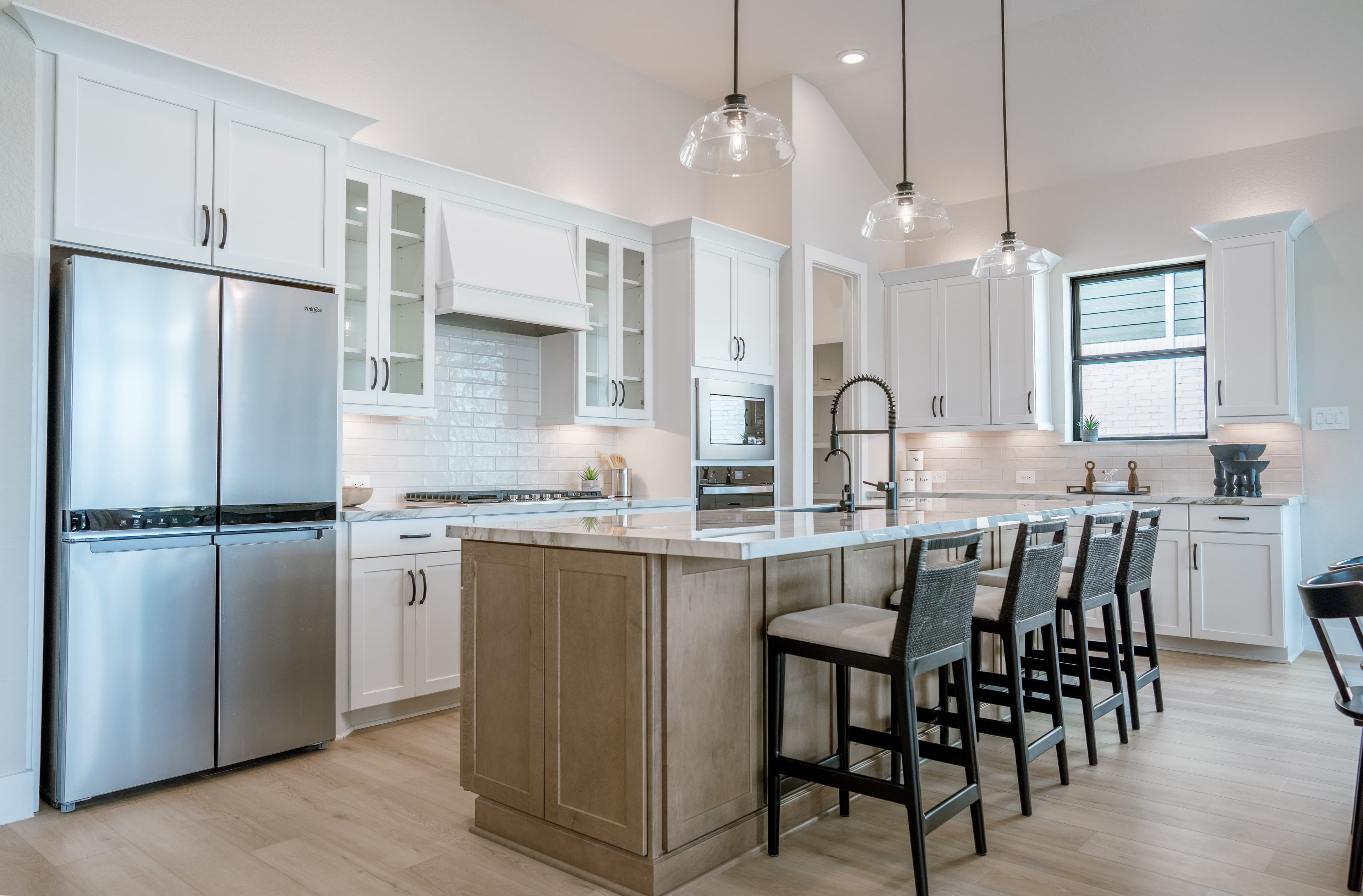 open kitchen with white cabinets