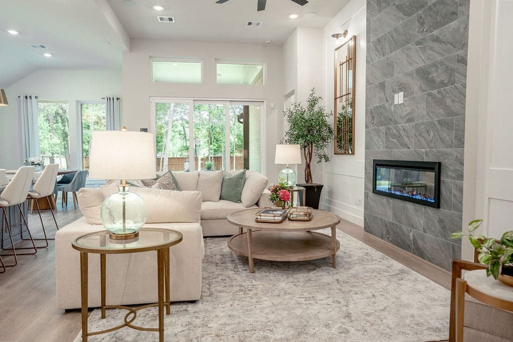 open great room with tall ceilings and fireplace