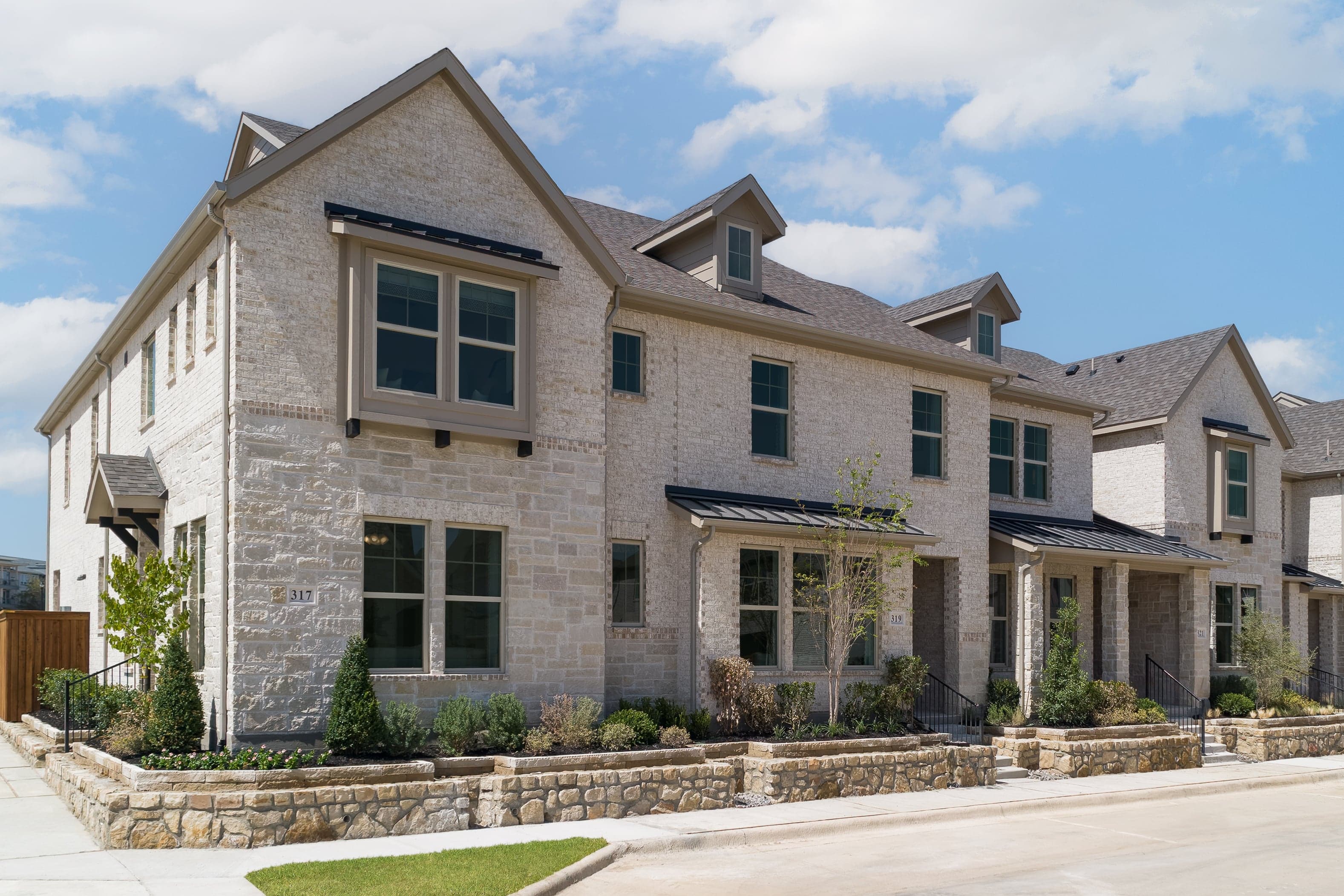townhouse exterior with brick and stone