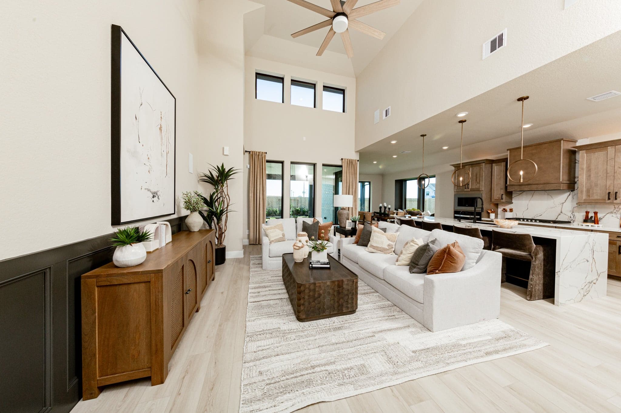large great room with two-story ceilings