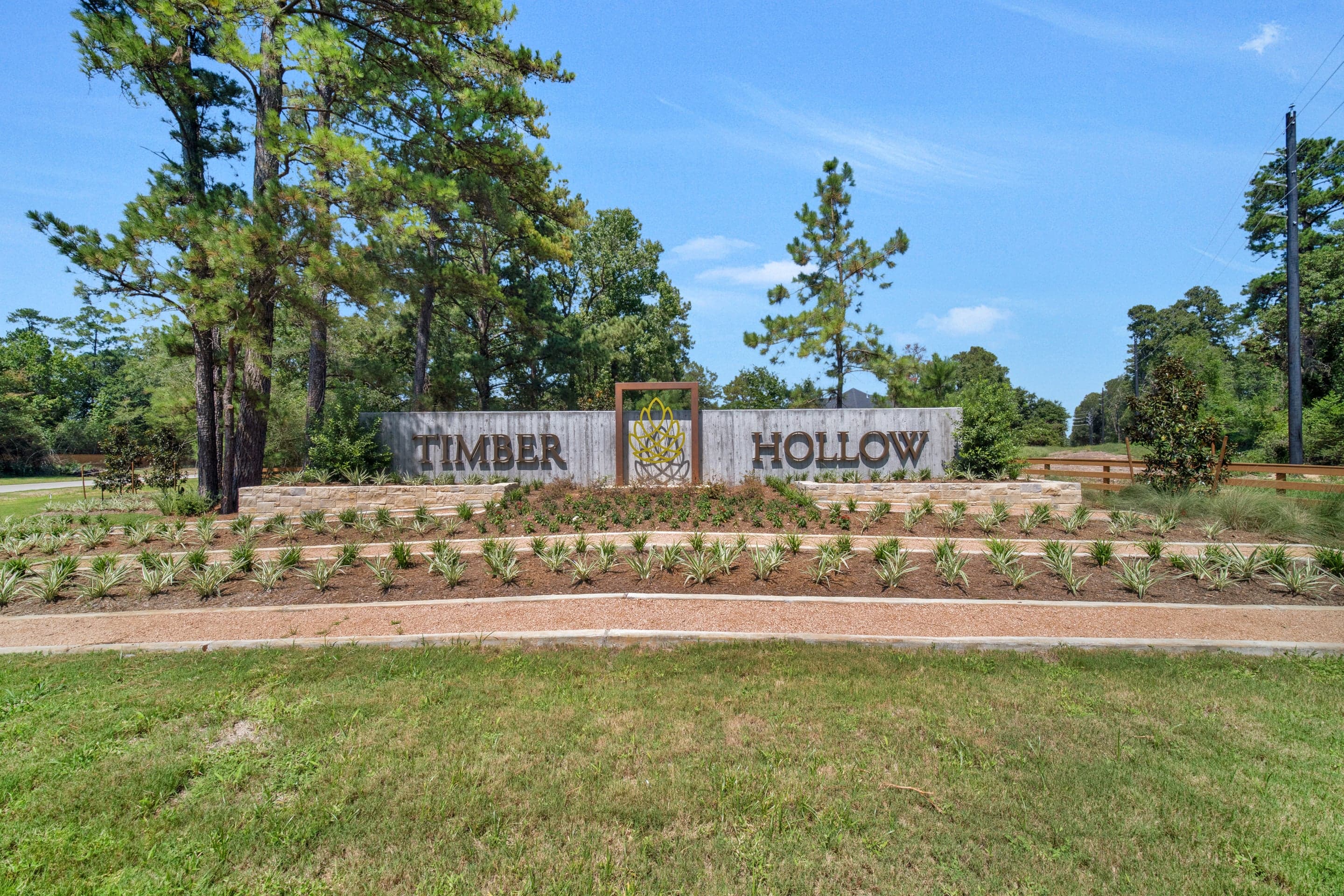entrance sign to wooded community