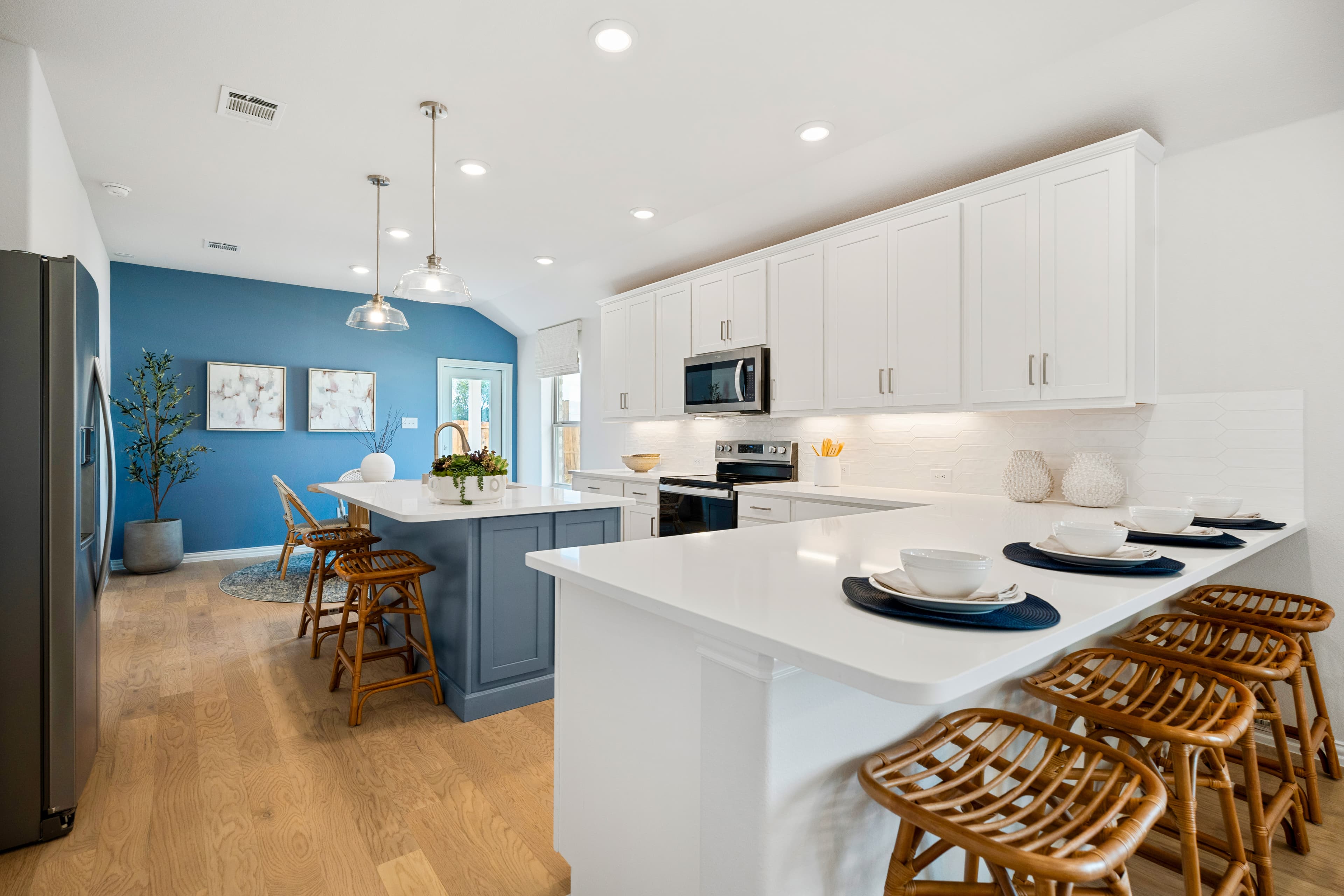 kitchen with white cabinets and hardwood floors