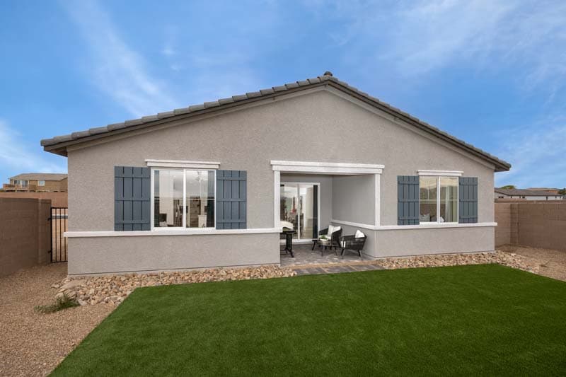 backyard with covered patio and desert landscaping