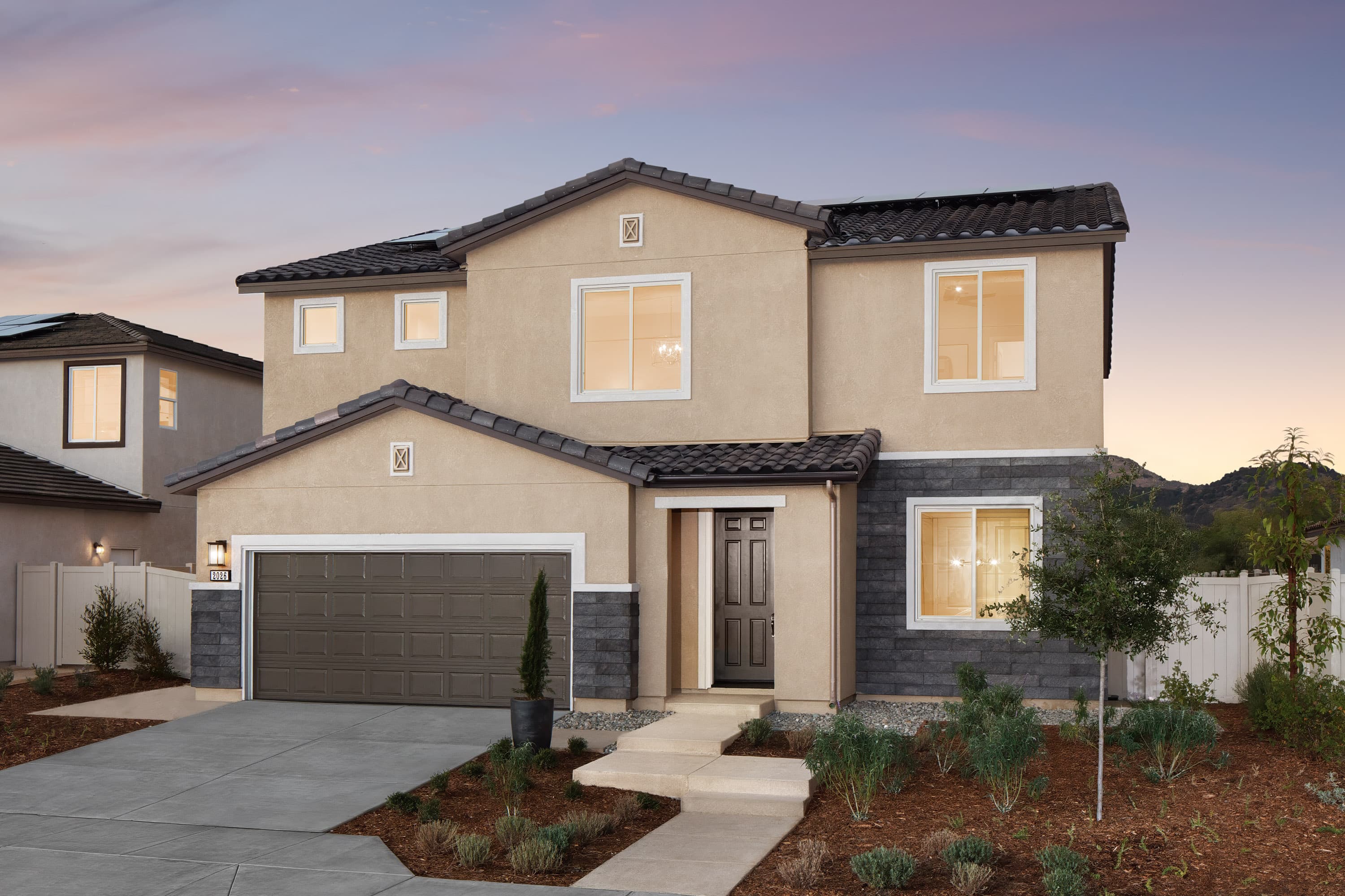 exterior features a grey brick trim