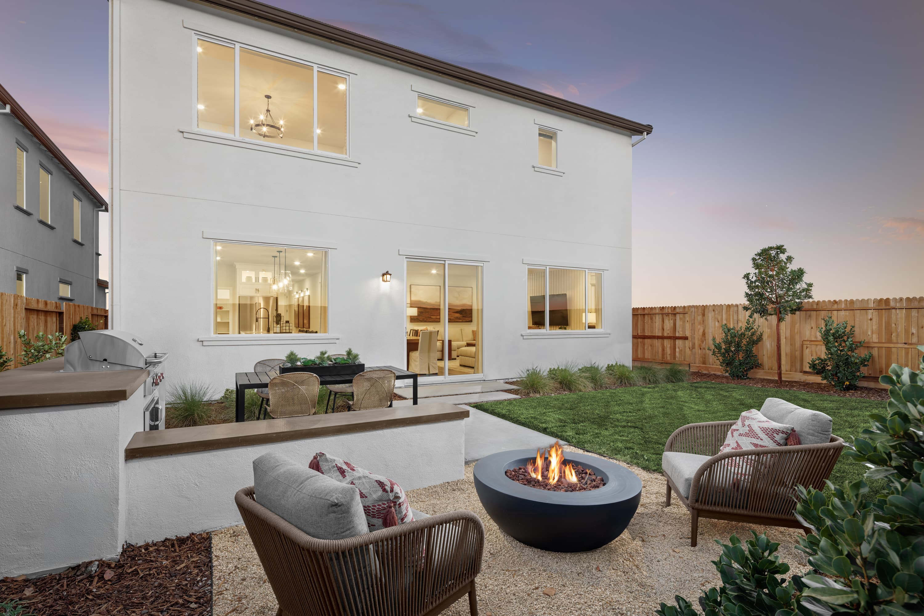 yard with round fire pit, and outdoor furniture