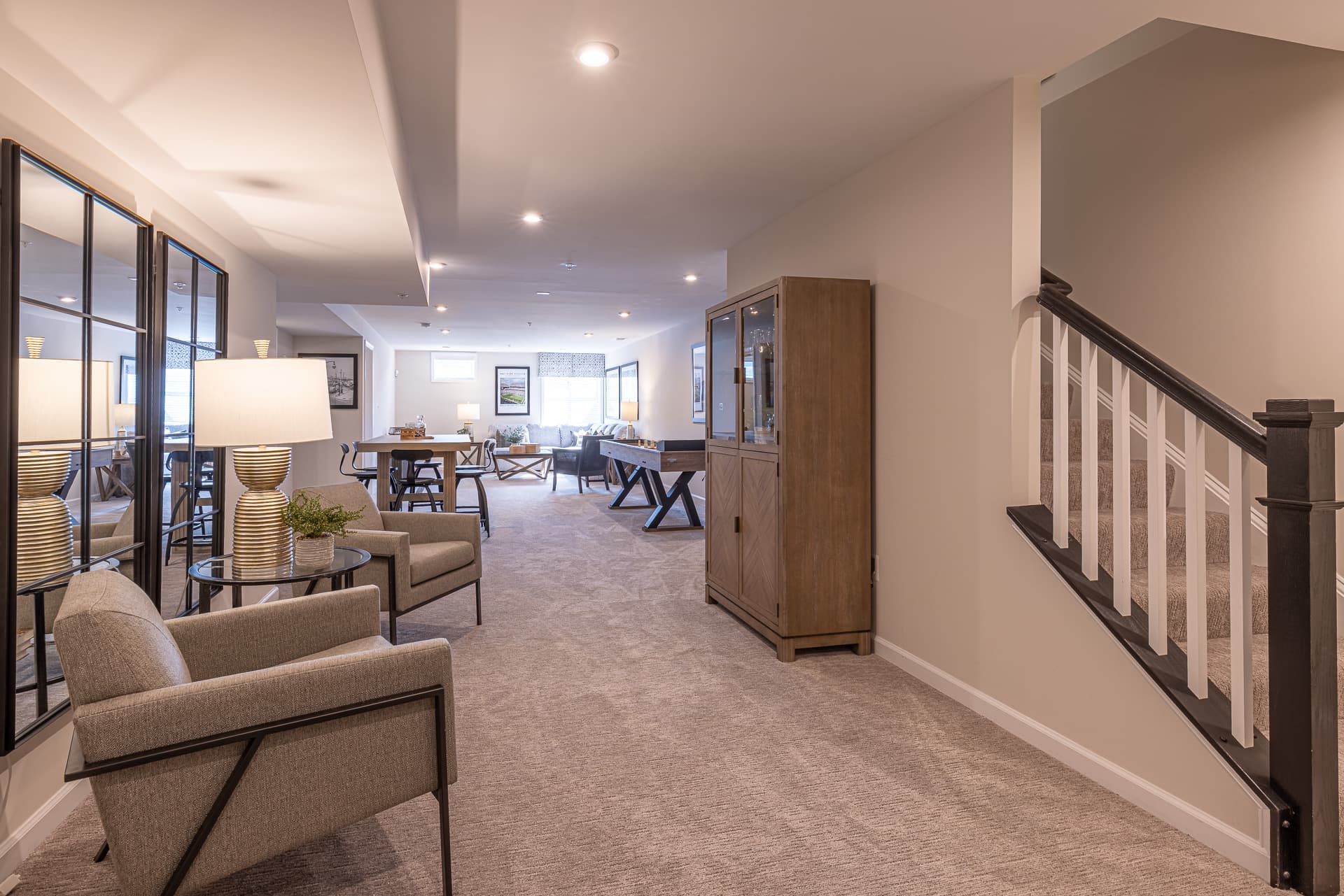 finished basement with carpet and extra seating
