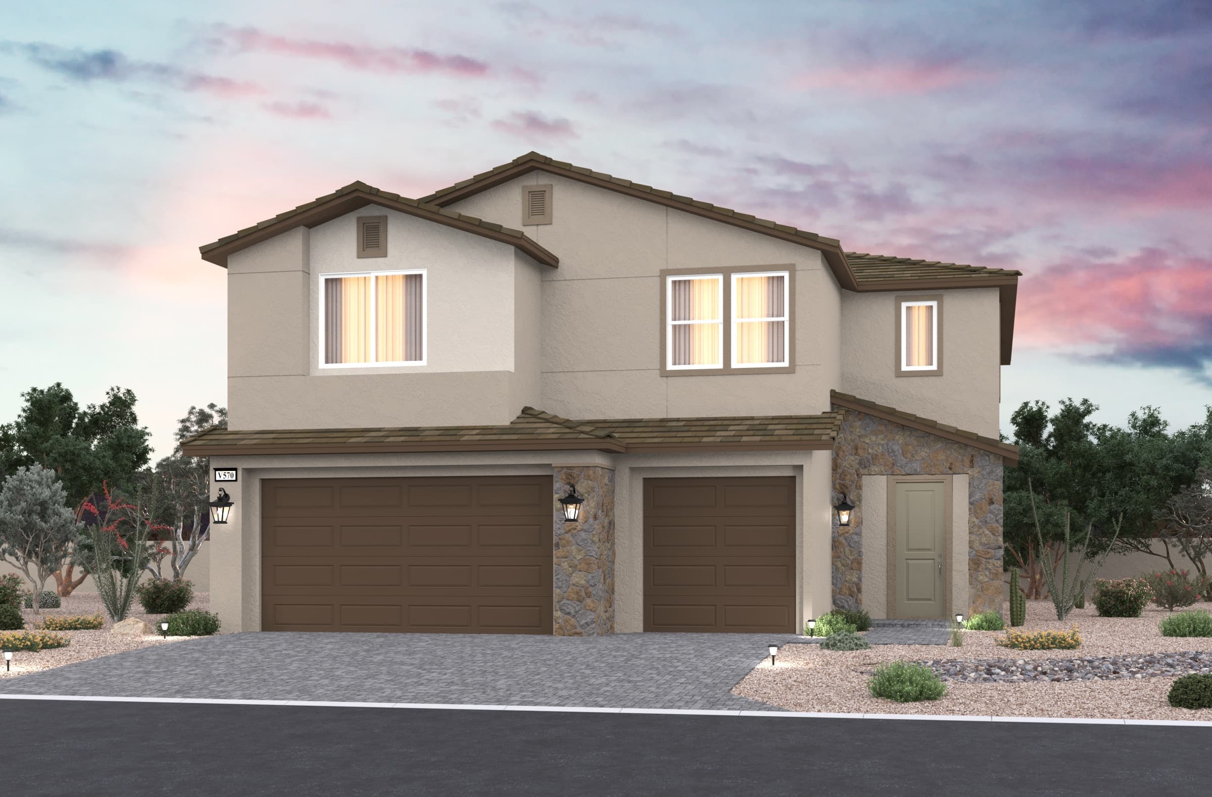 exterior with three-car garage and stone entrance