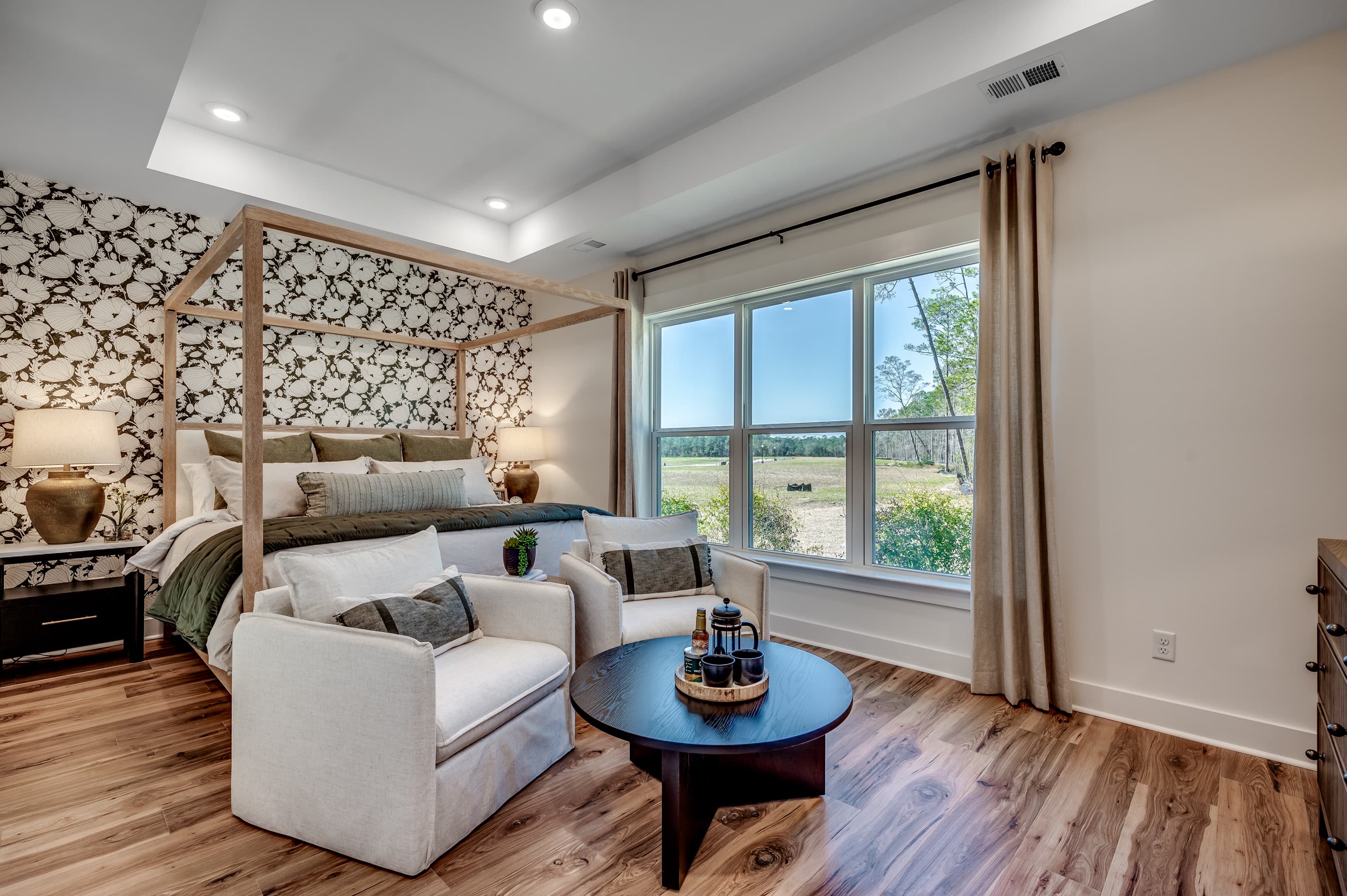 bright room with bed and accent wall