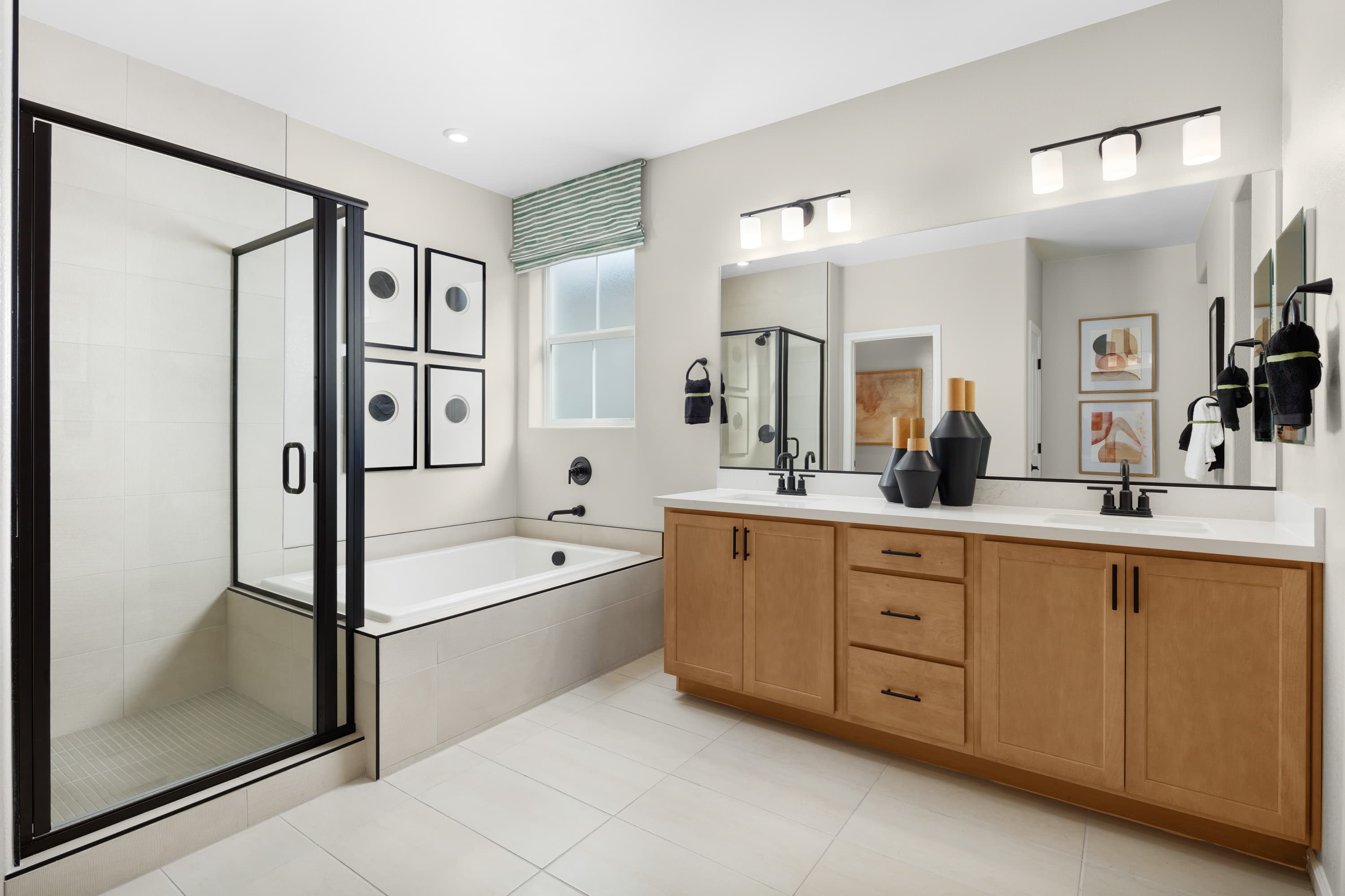 primary bathroom with separate tub and shower