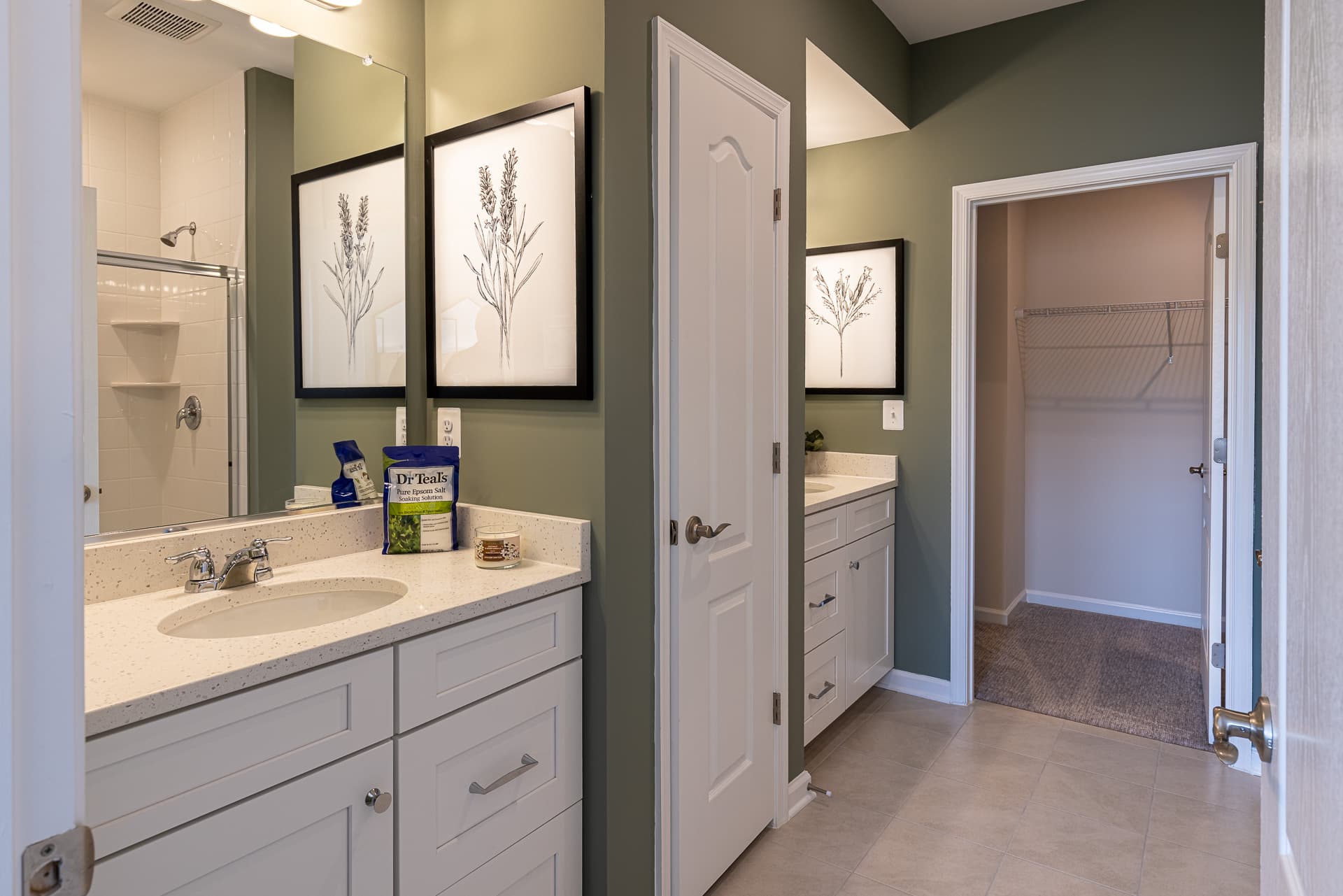 primary bath featuring separate vanities