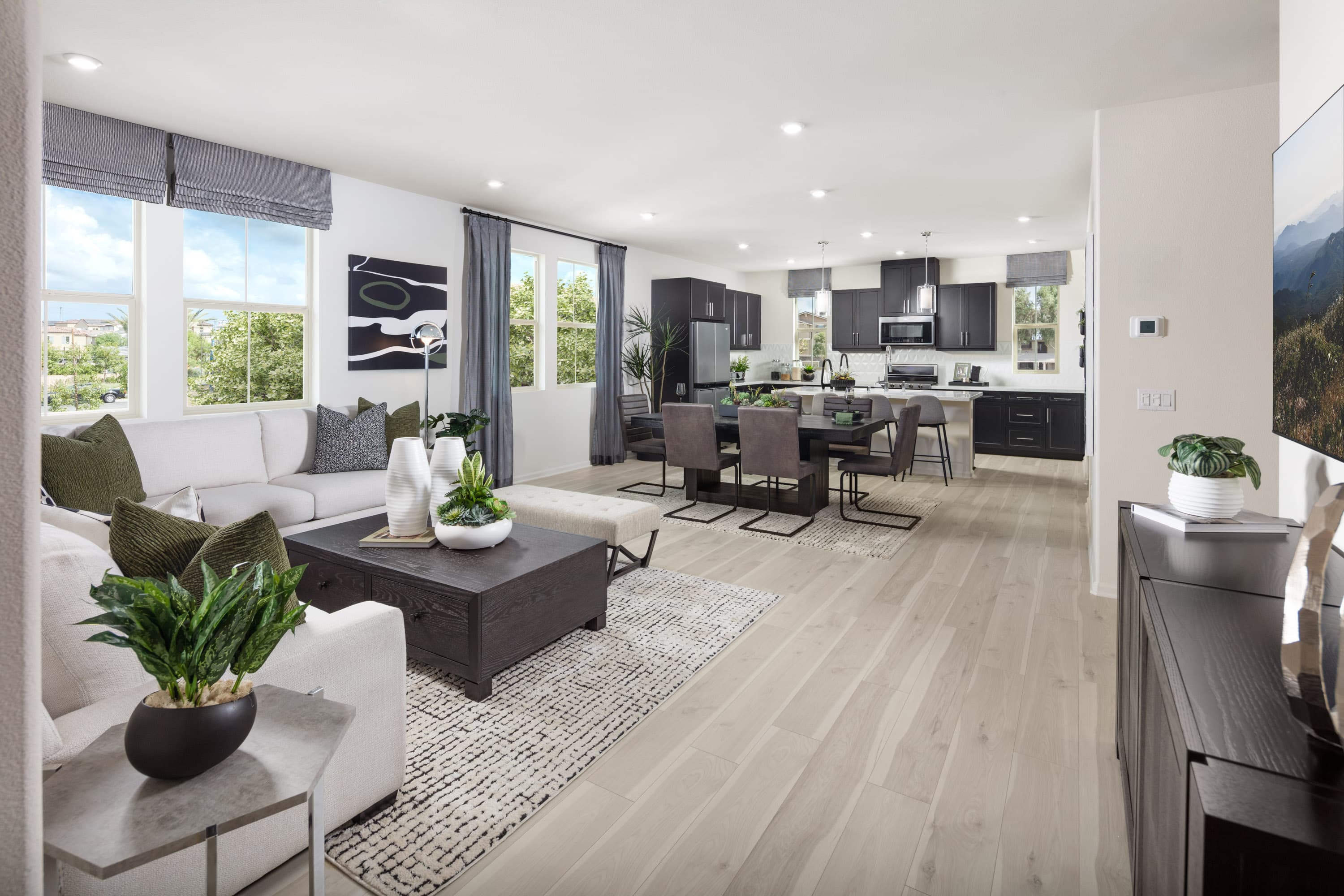 great room with wood-like flooring and couch area