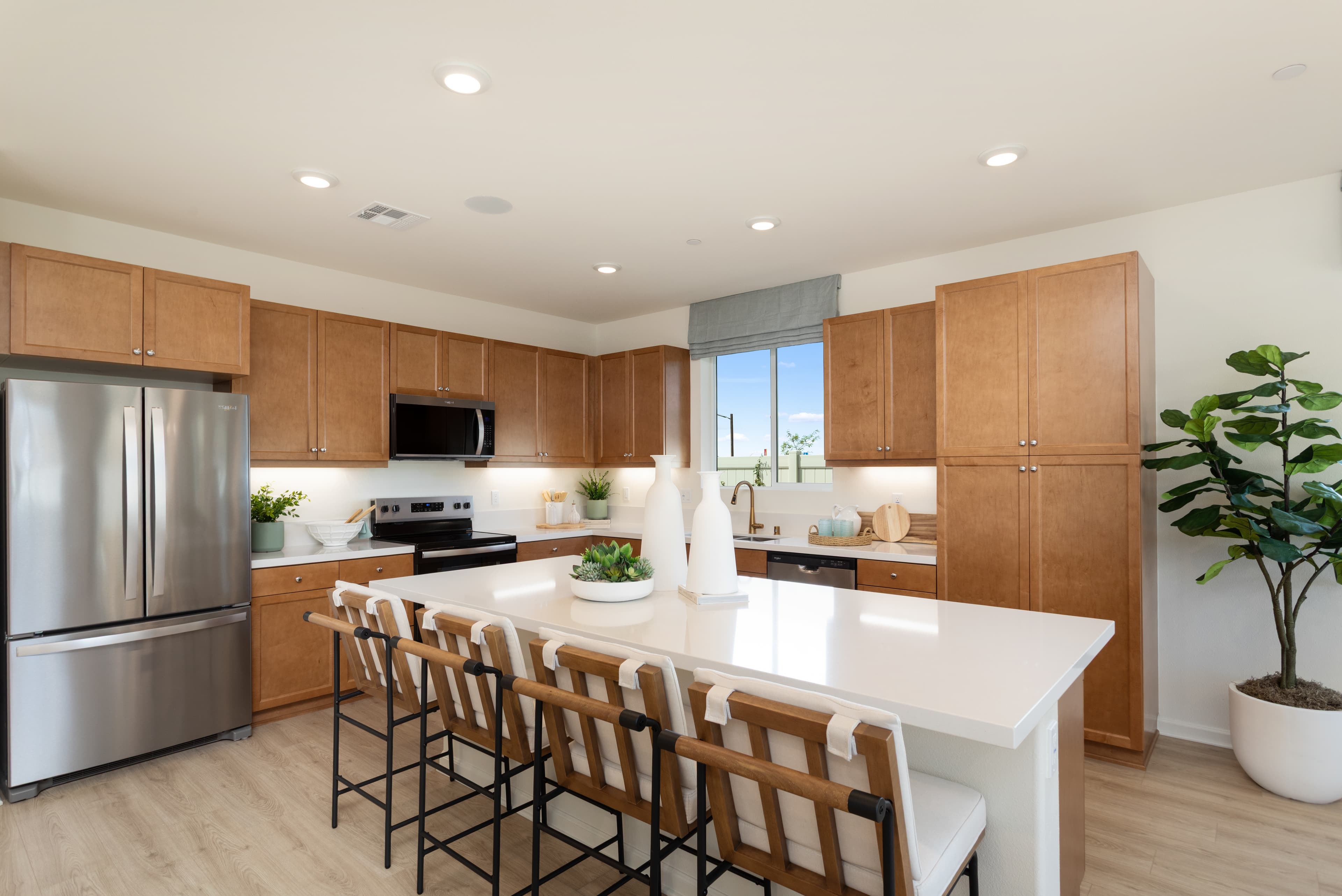 kitchen with white countertops and neutral cabinets