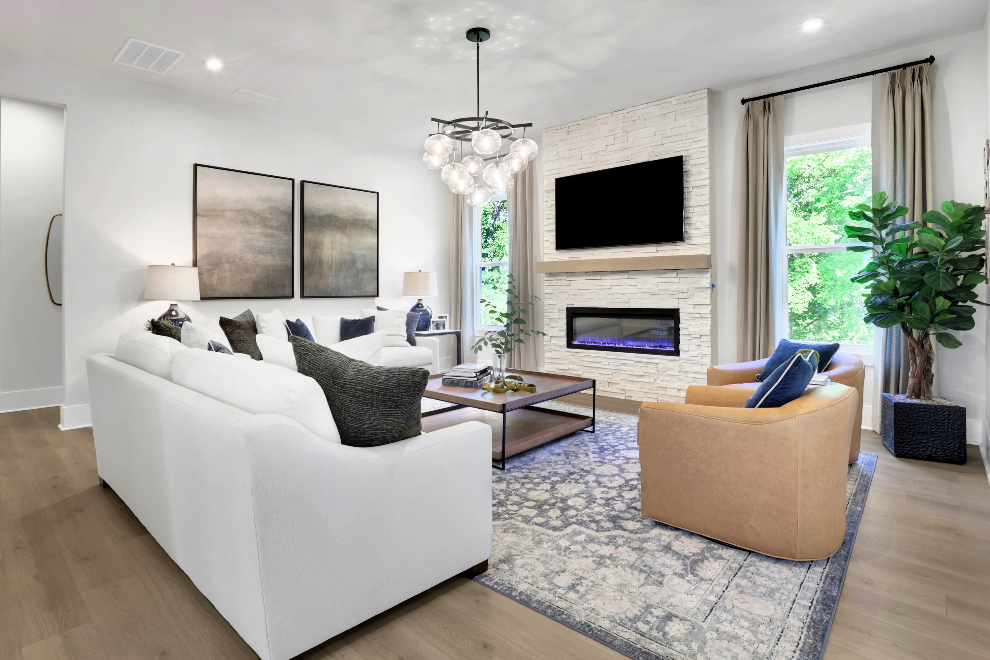 great room with electric fireplace and hard surface flooring