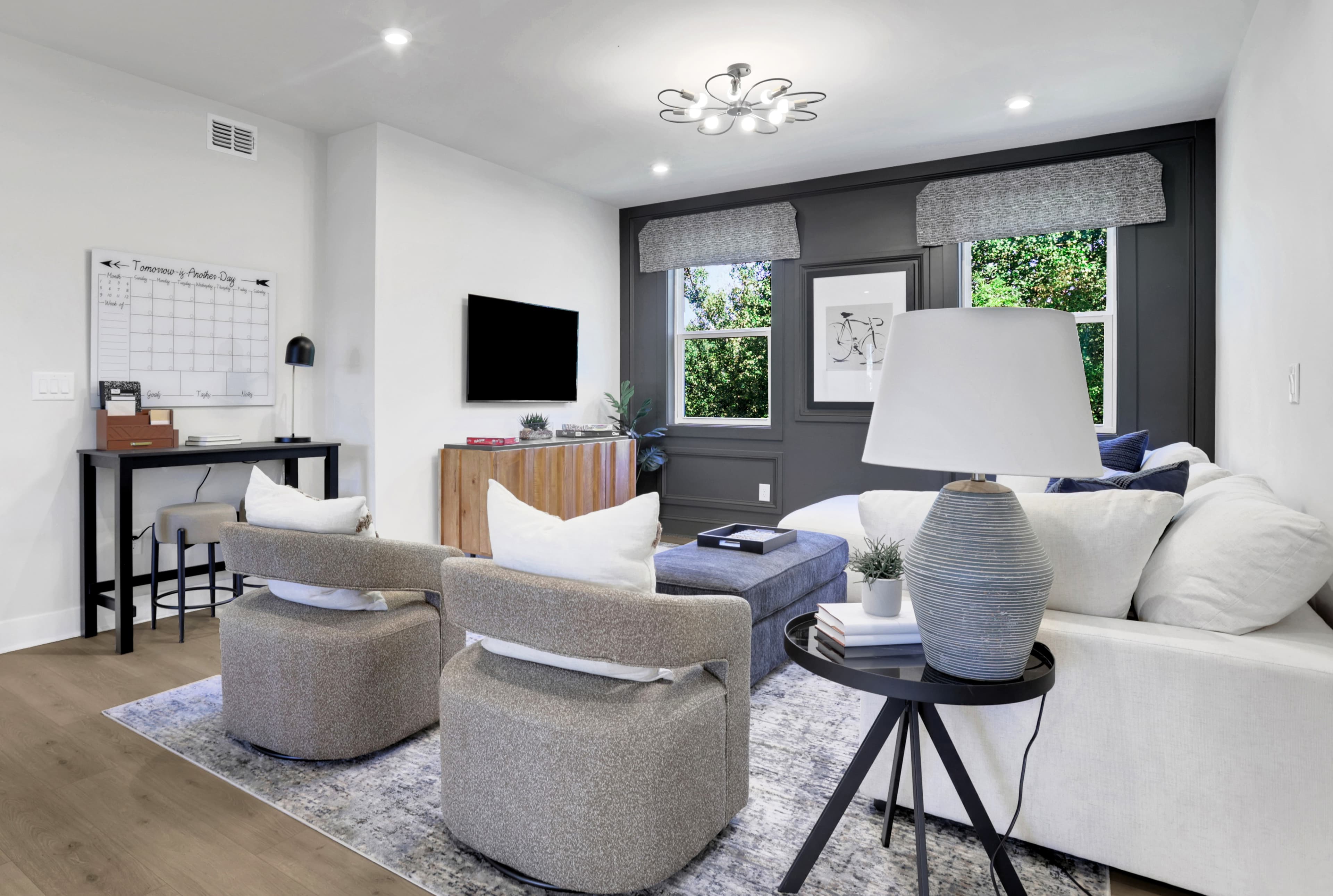 loft with hard surface flooring and windows