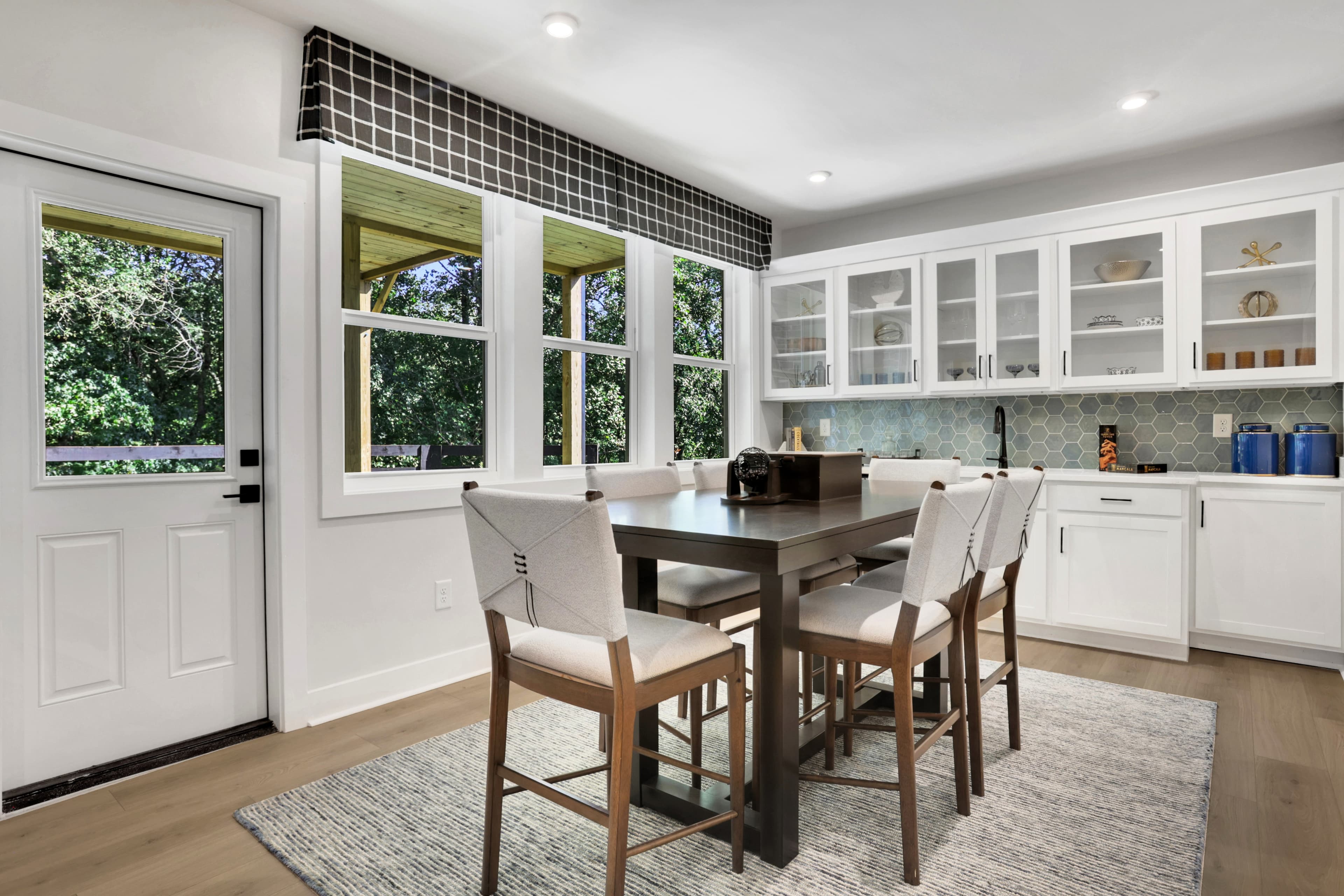 basement kitchenette space with dining table