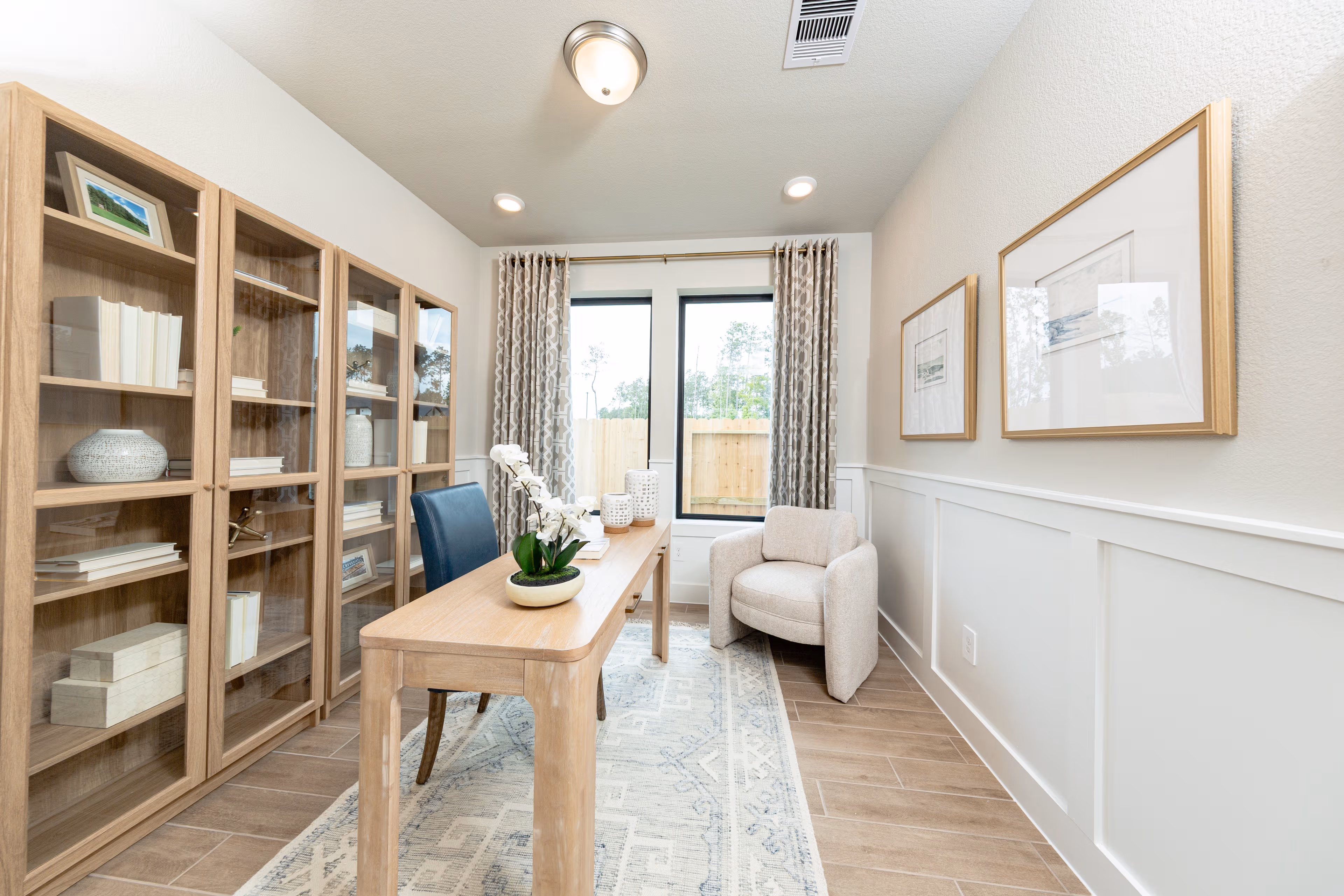 spacious study with hardwood flooring