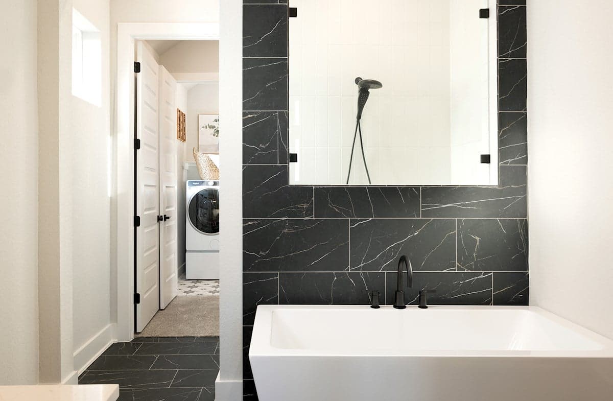 bathroom with soaking tub & a walk-in shower