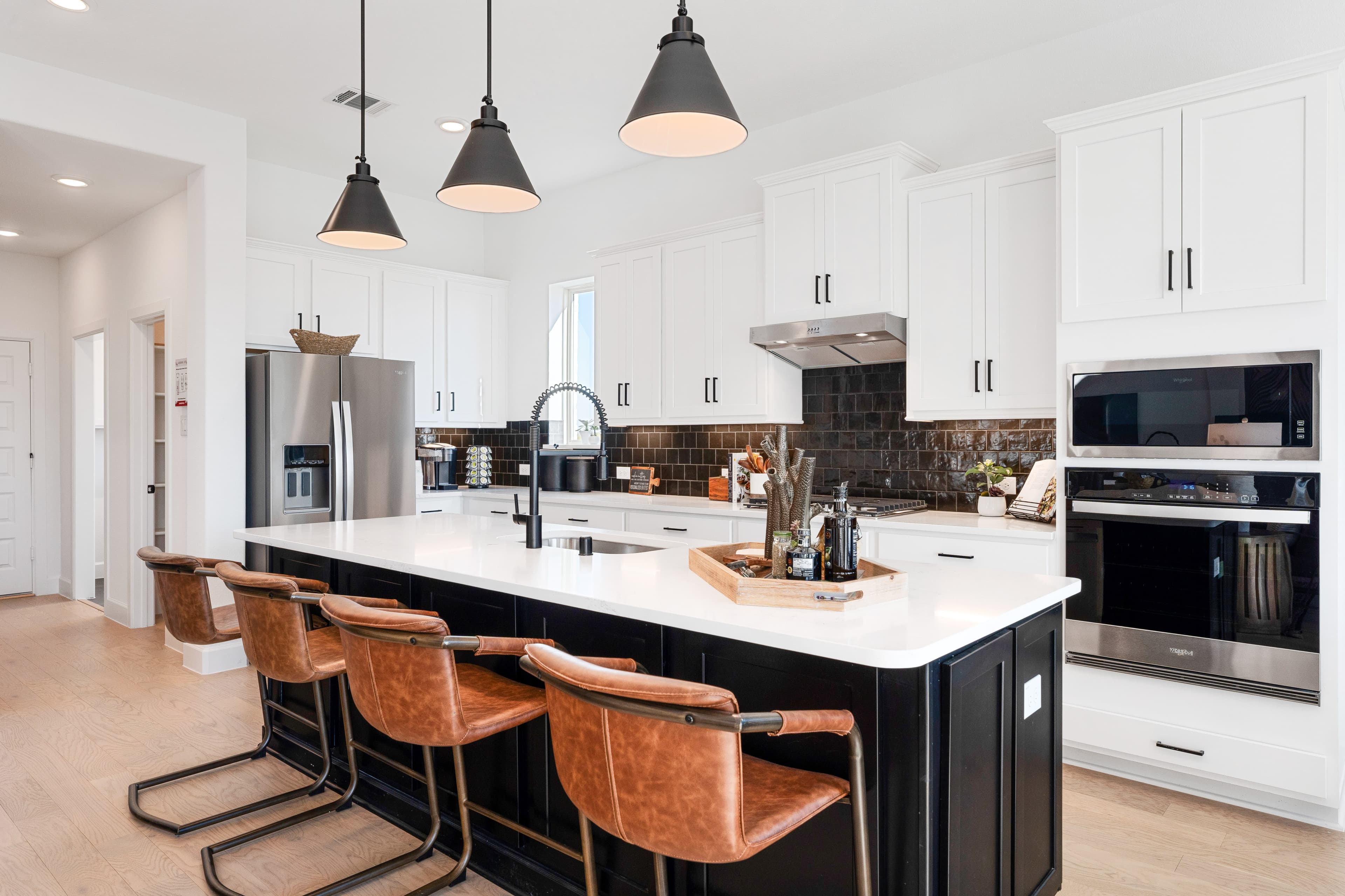 open kitchen with white cabinets