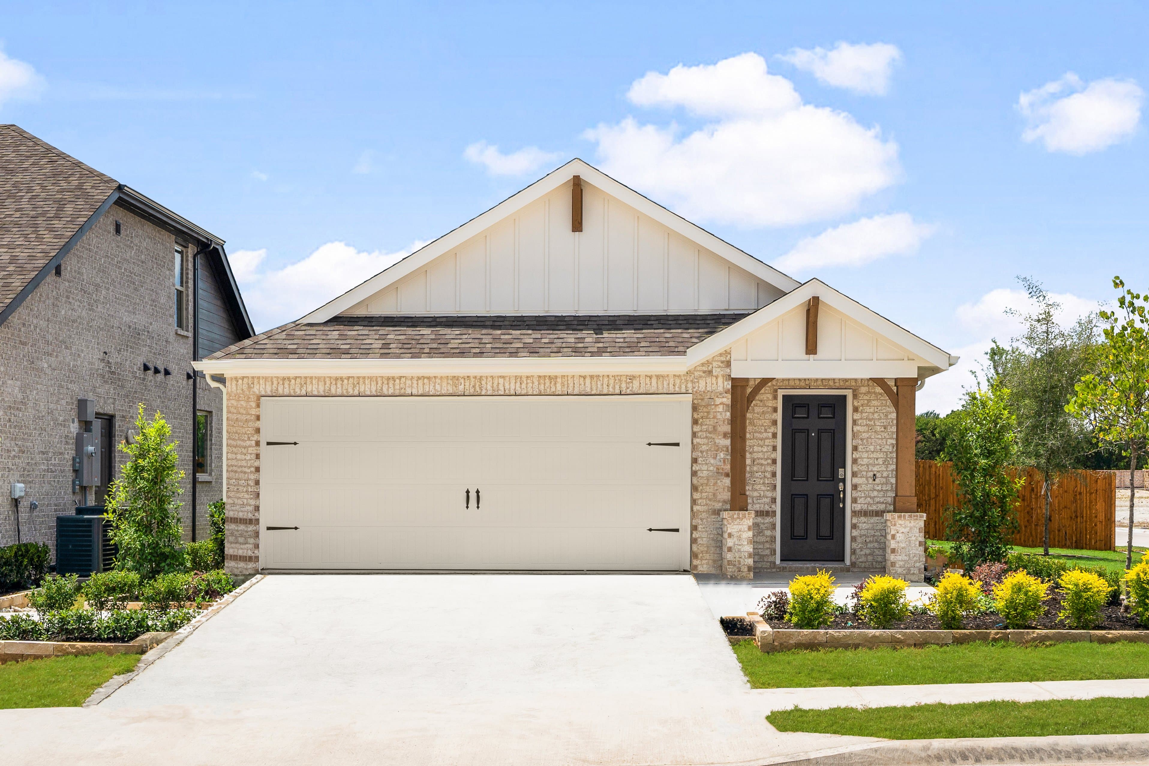 one-story home with brick and stone exterior