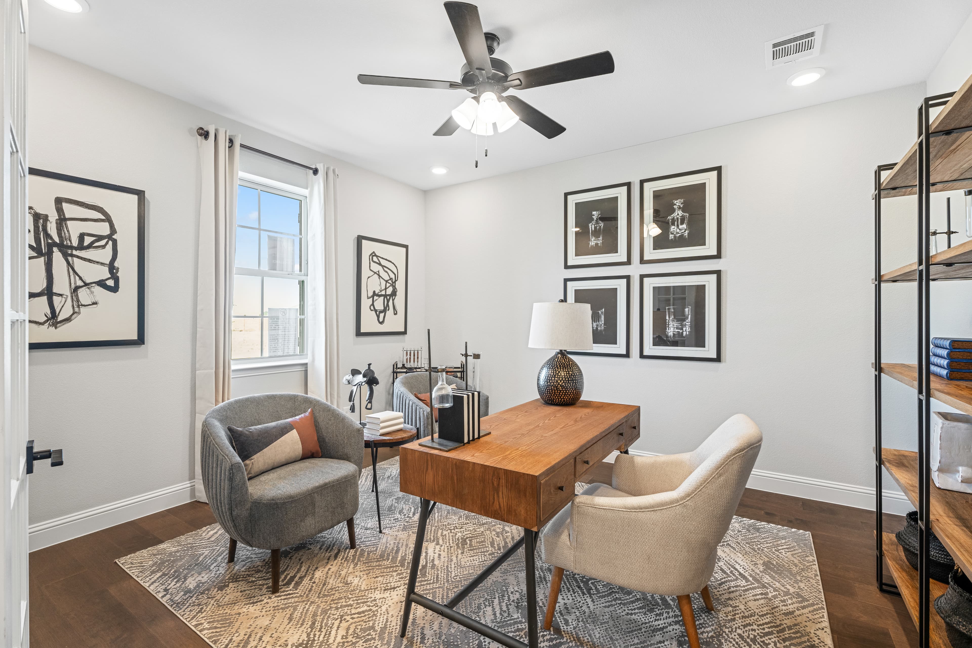 study with wood floors and windows