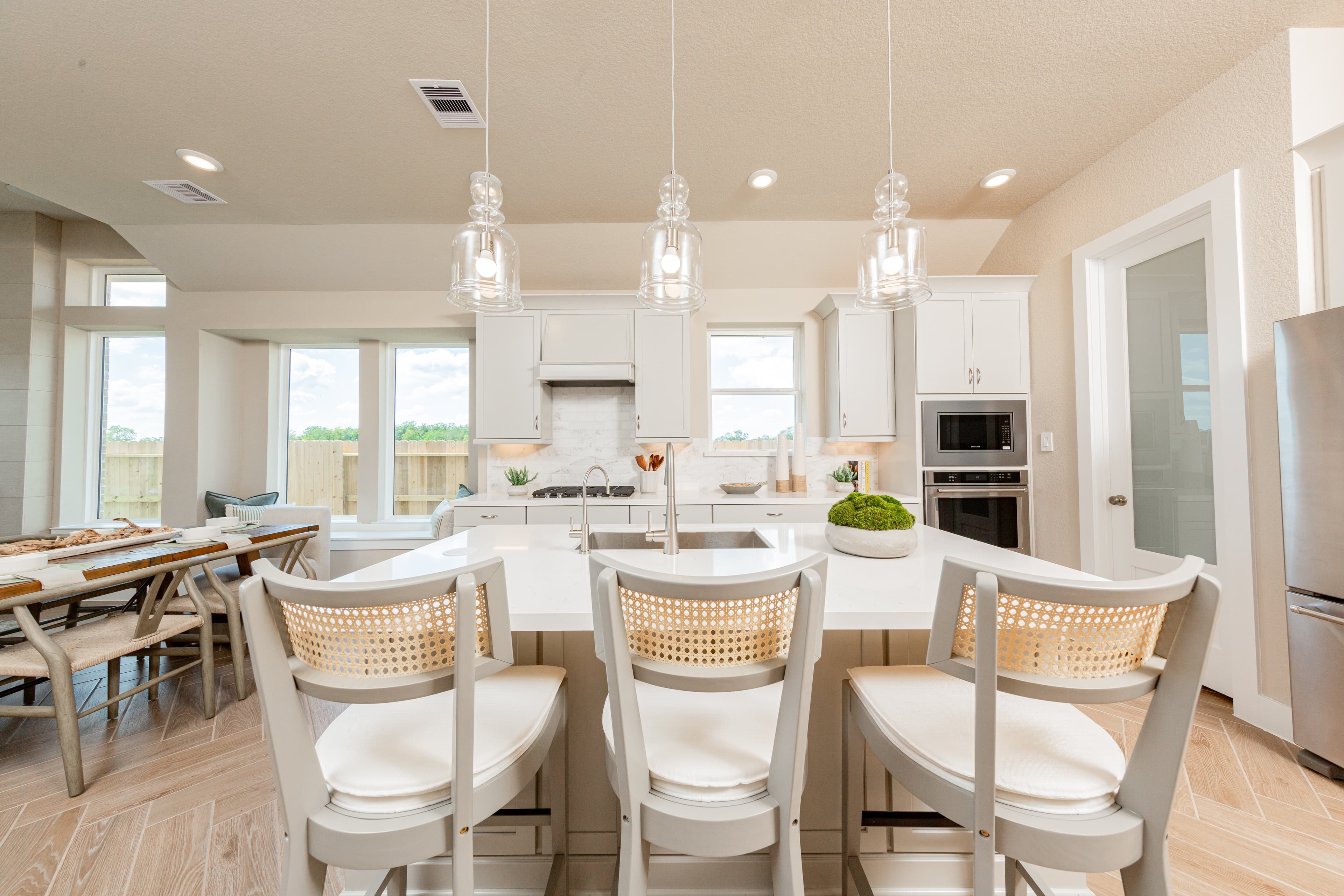 open kitchen with beige cabinets
