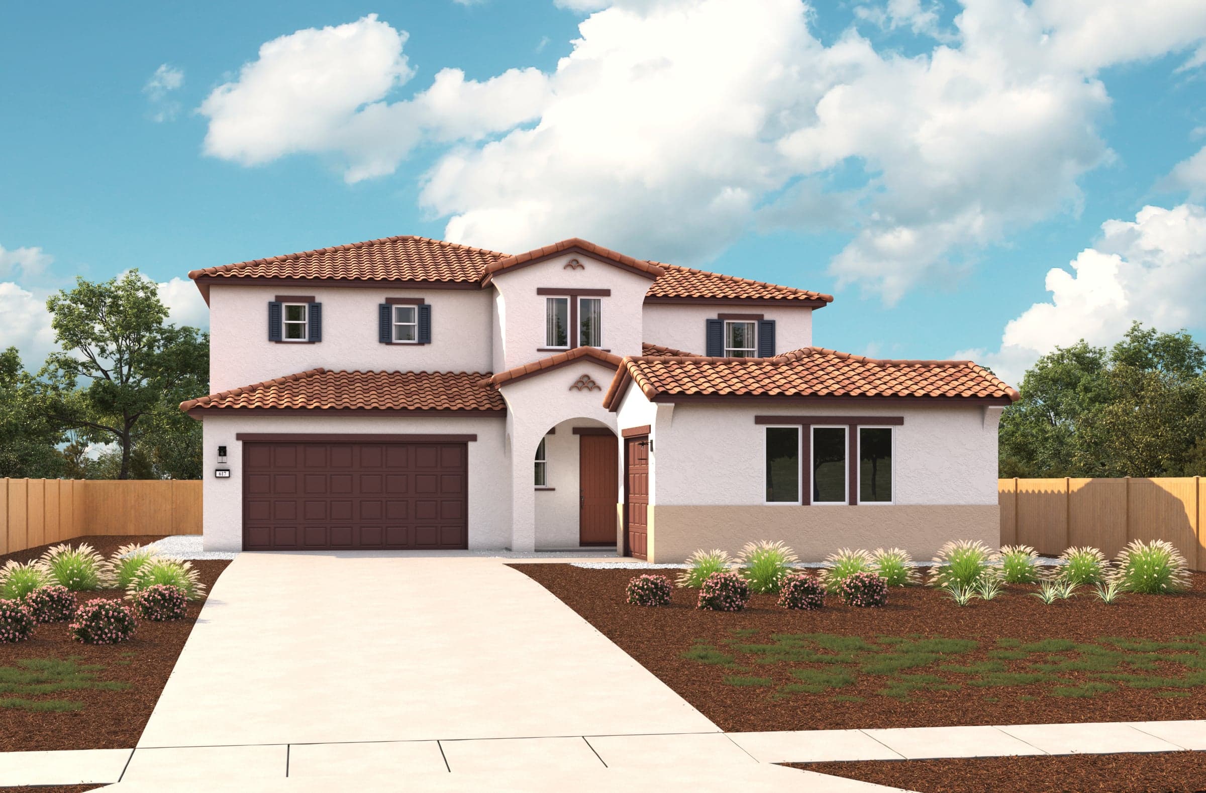 front exterior of two-story white and brown spanish style home with tile roof