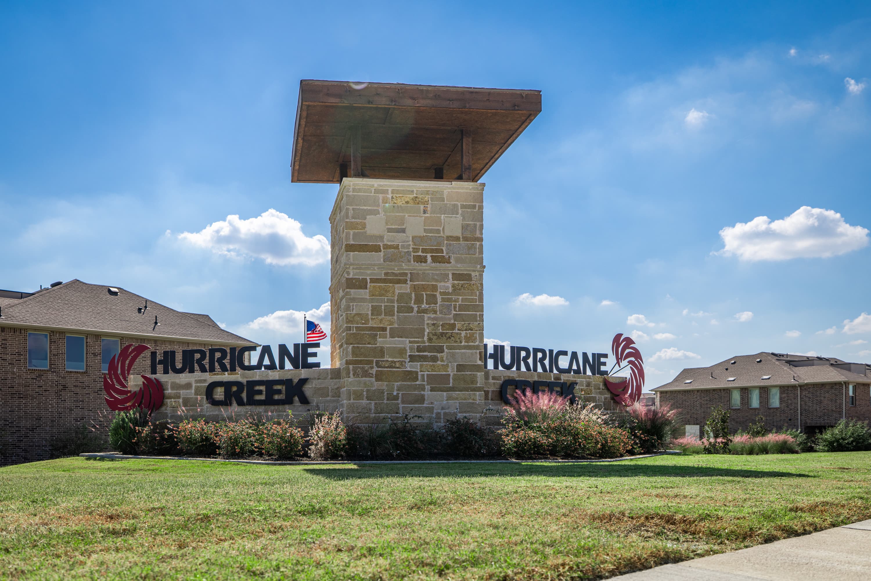 stone entrance sign to community