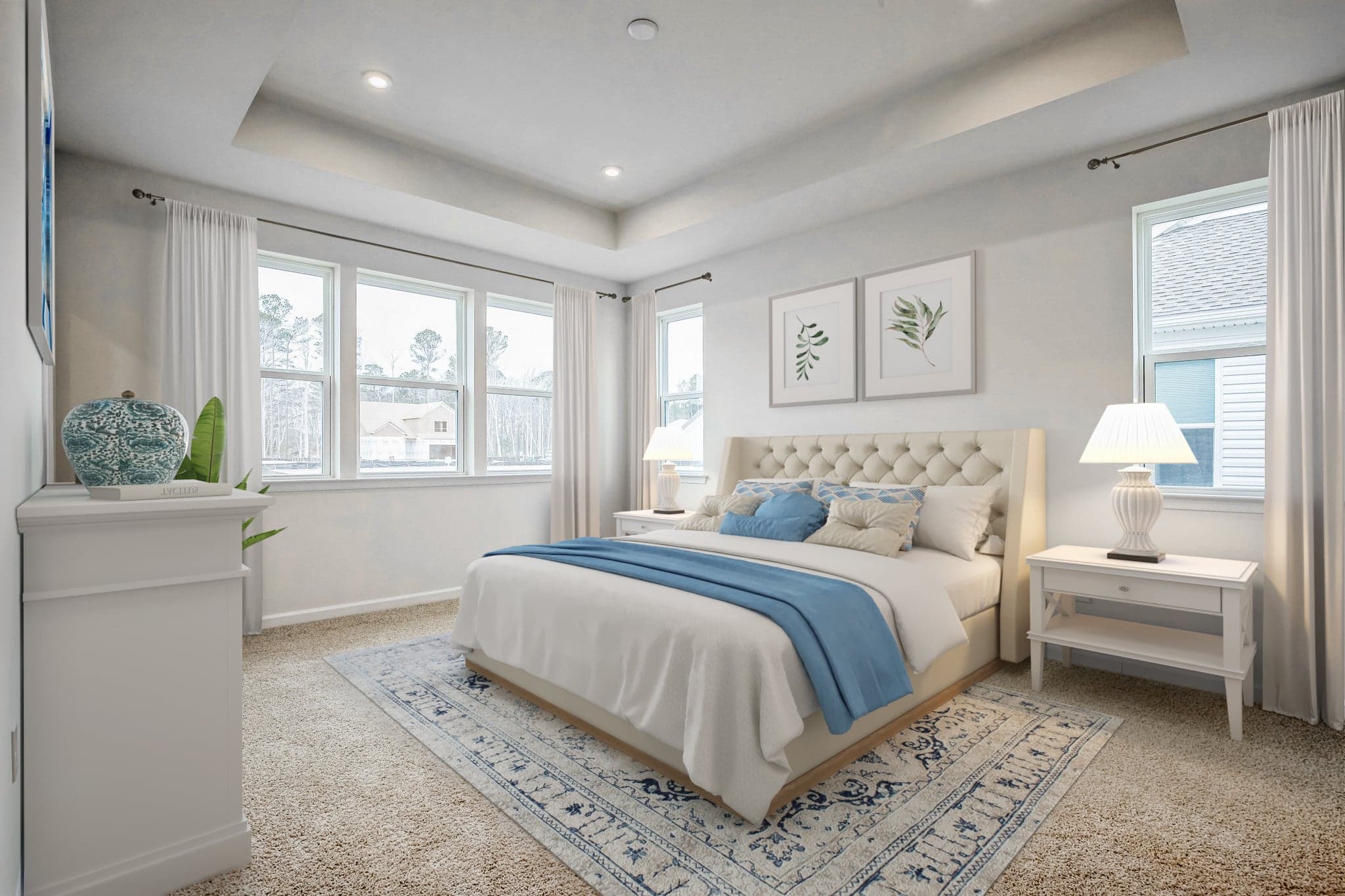 primary suite with carpet and a king-sized bed