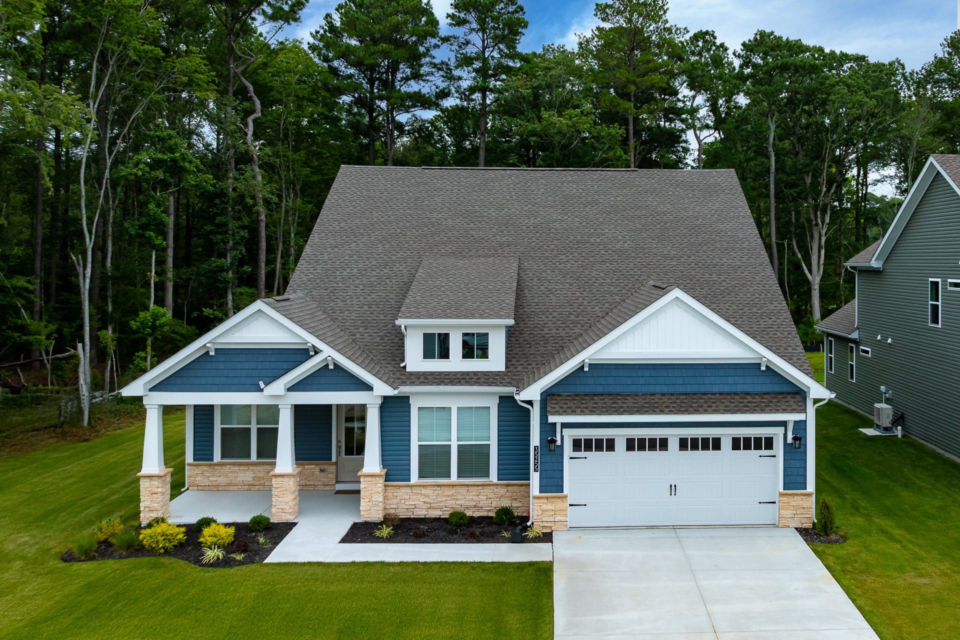 single-family home exterior with a 2-car garage