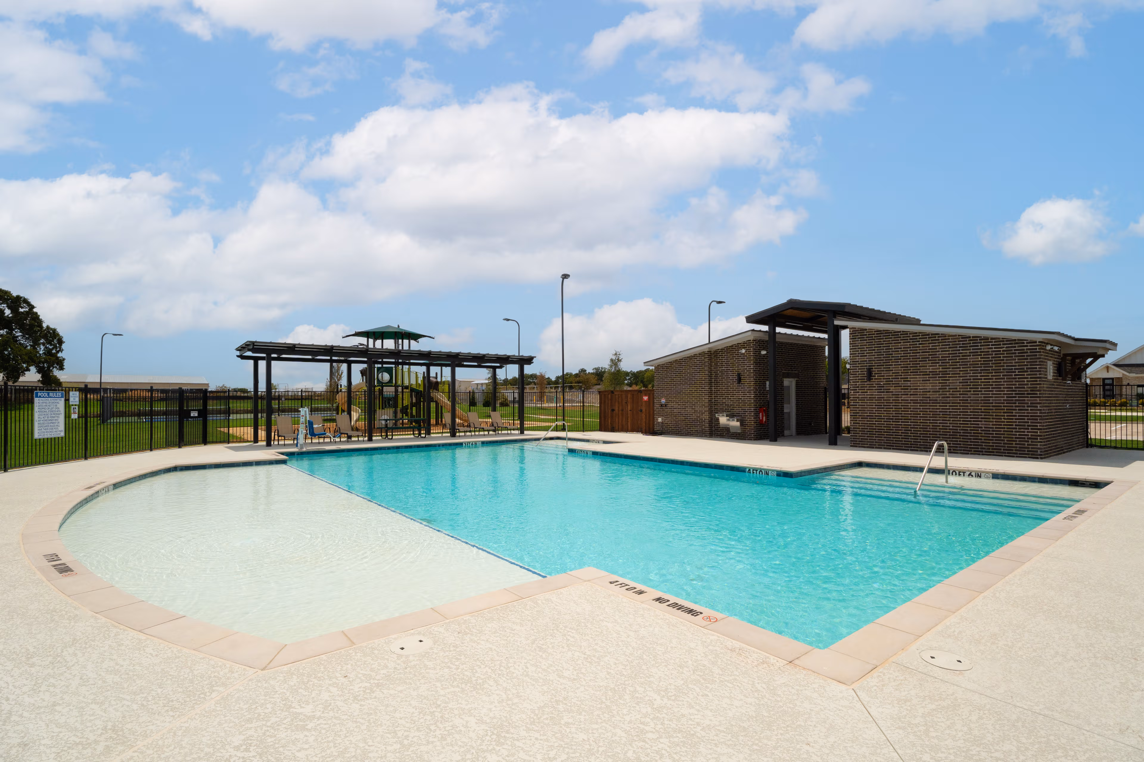 community pool with chairs