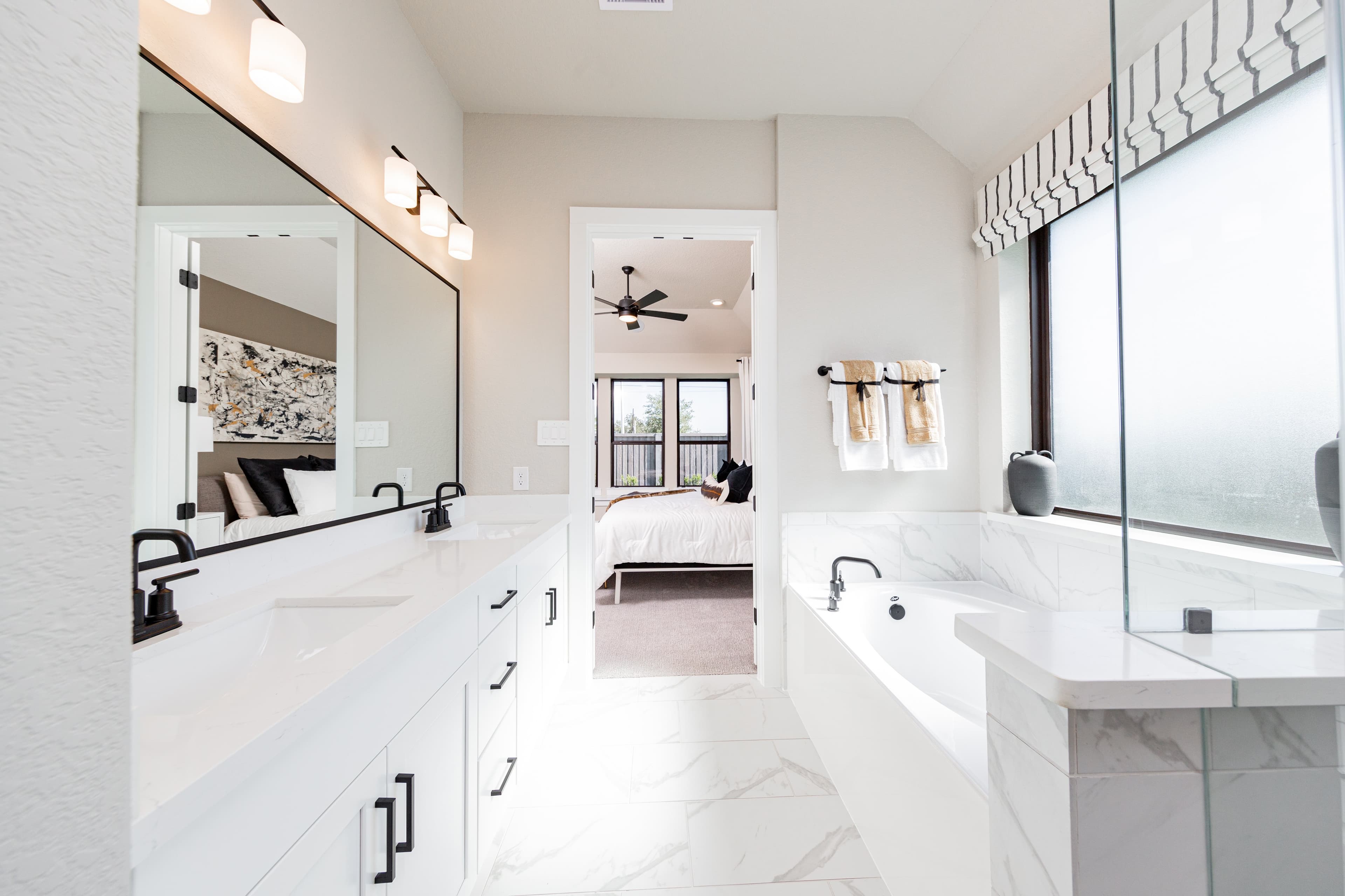 primary bathroom with soaking tub and shower