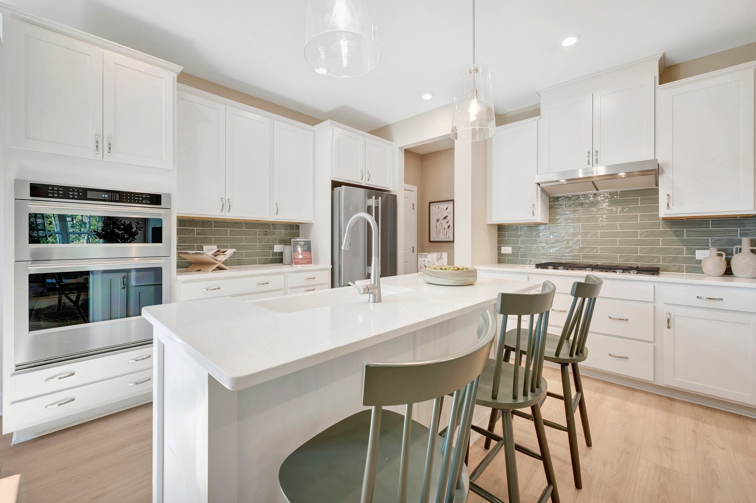 kitchen with an island with a sink
