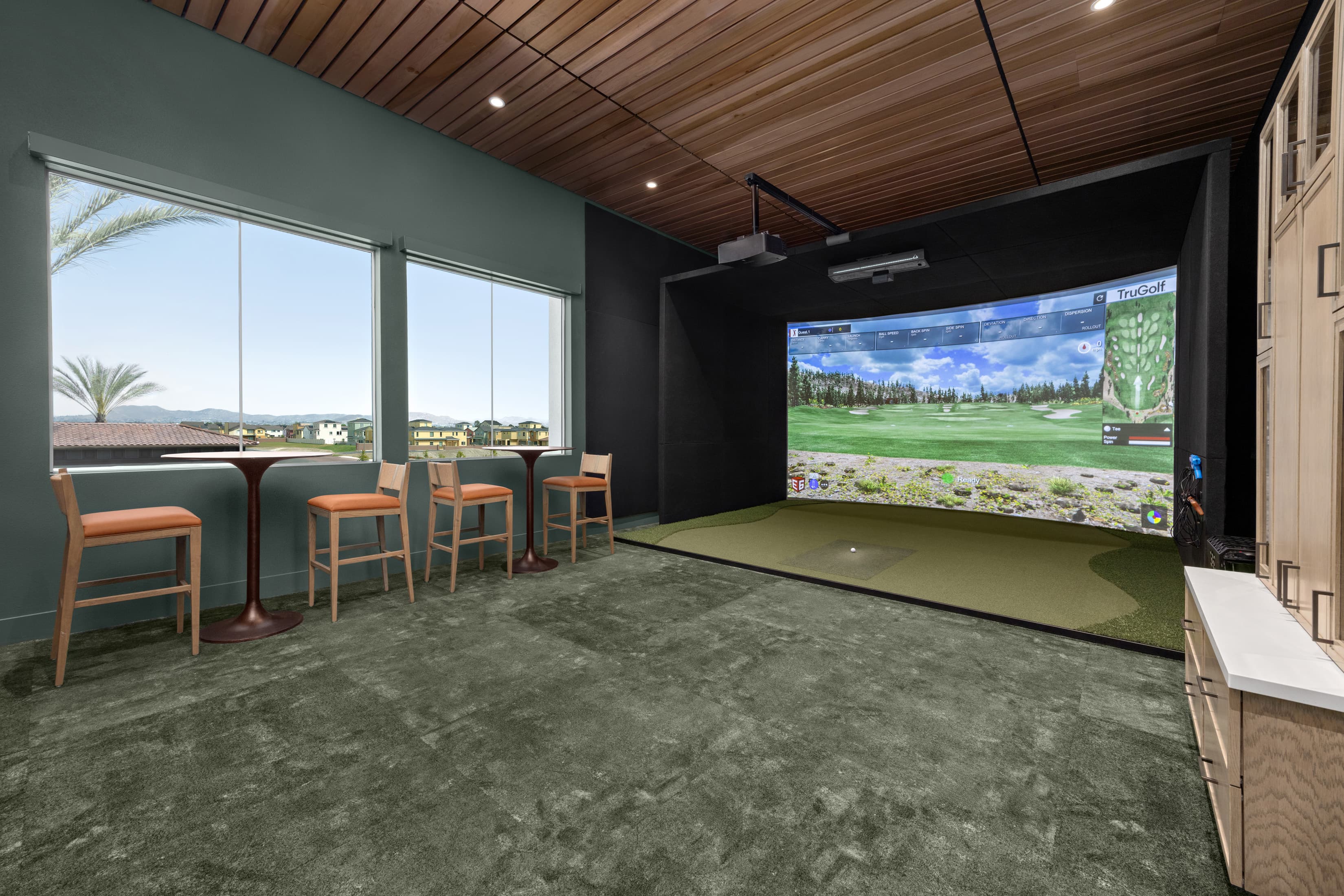 golf simulator game with seating area