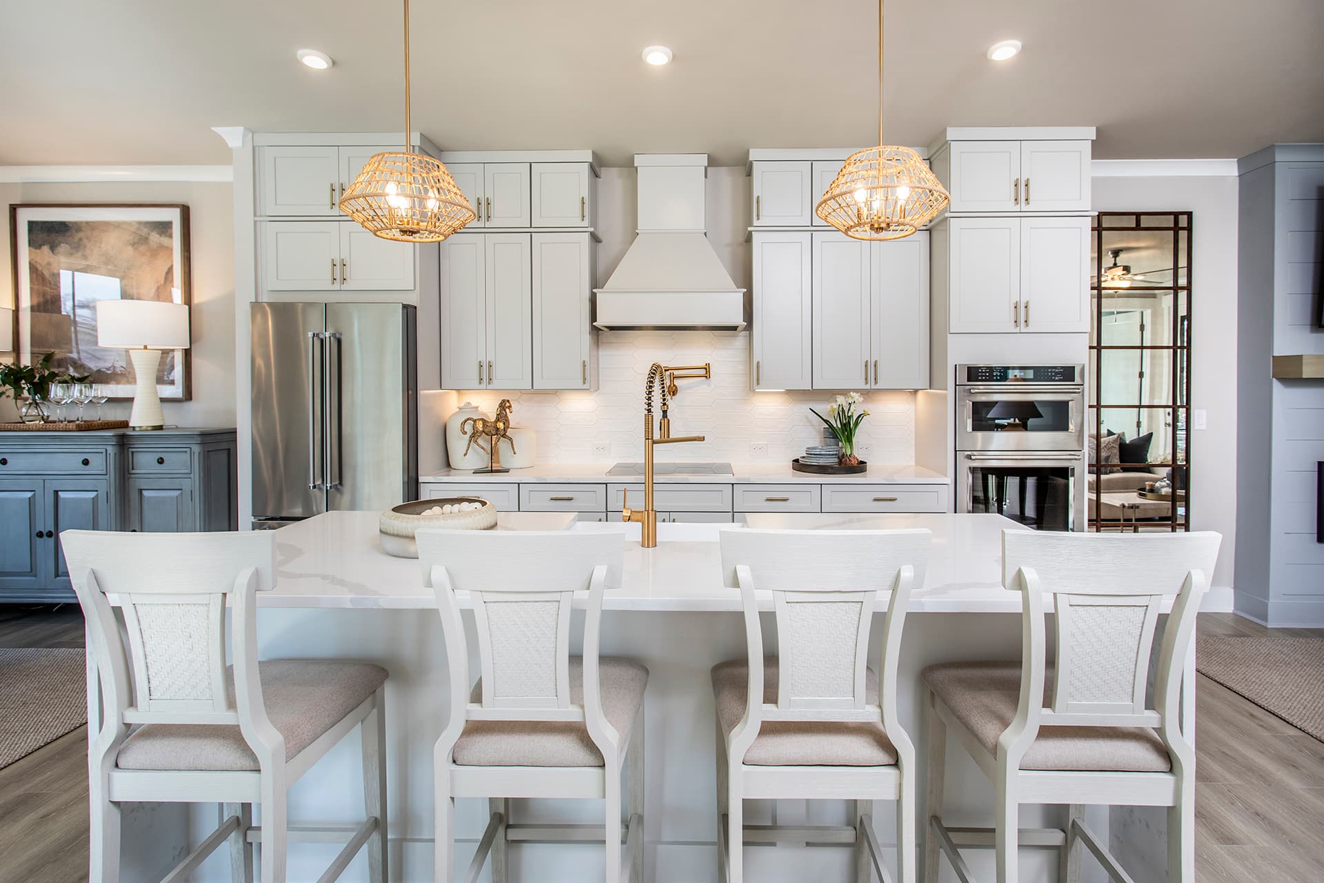 kitchen with white cabinets and gold hardware