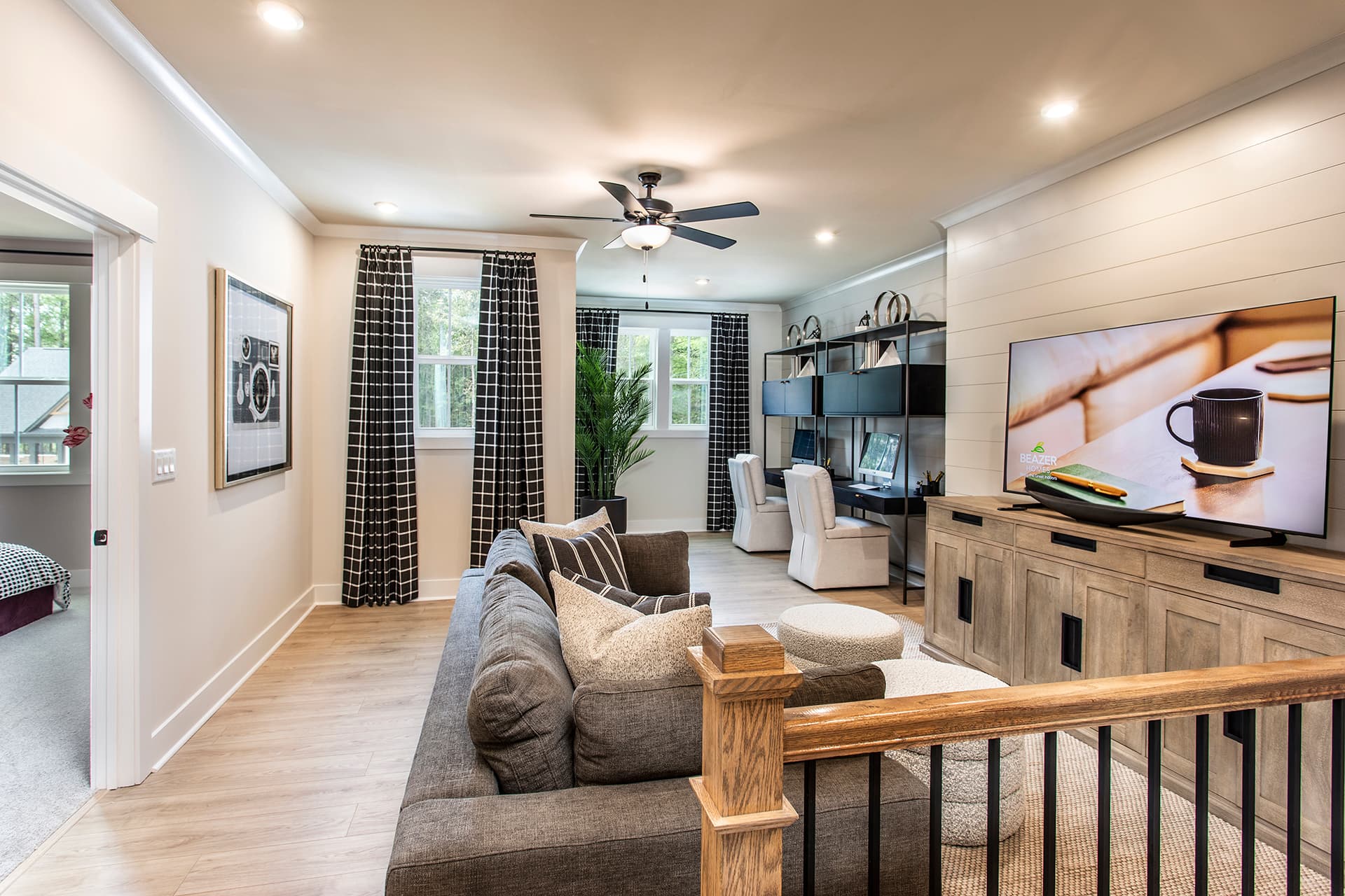 loft with hard surface flooring and windows