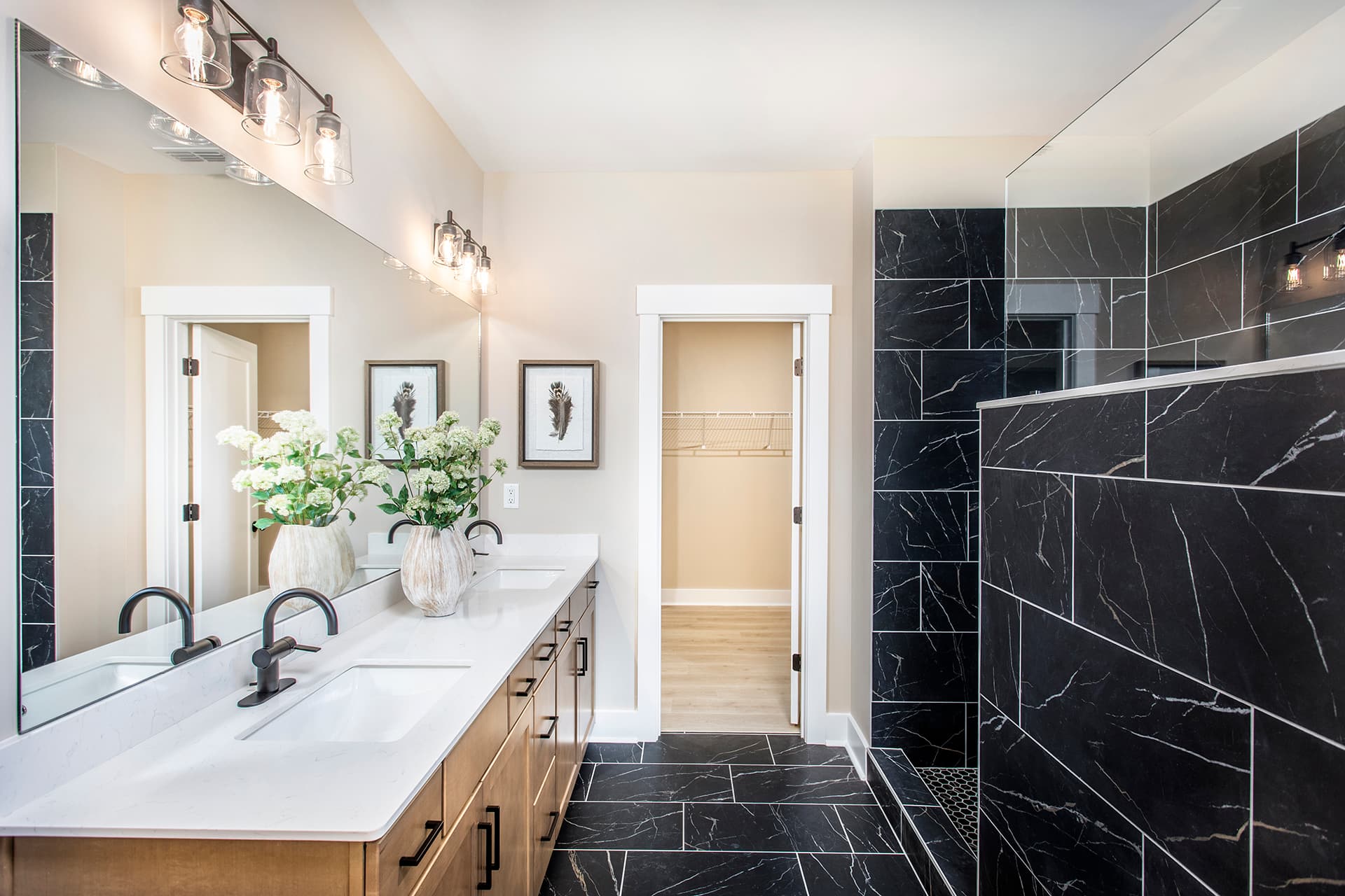 primary bathroom with dual vanity & walk-in shower