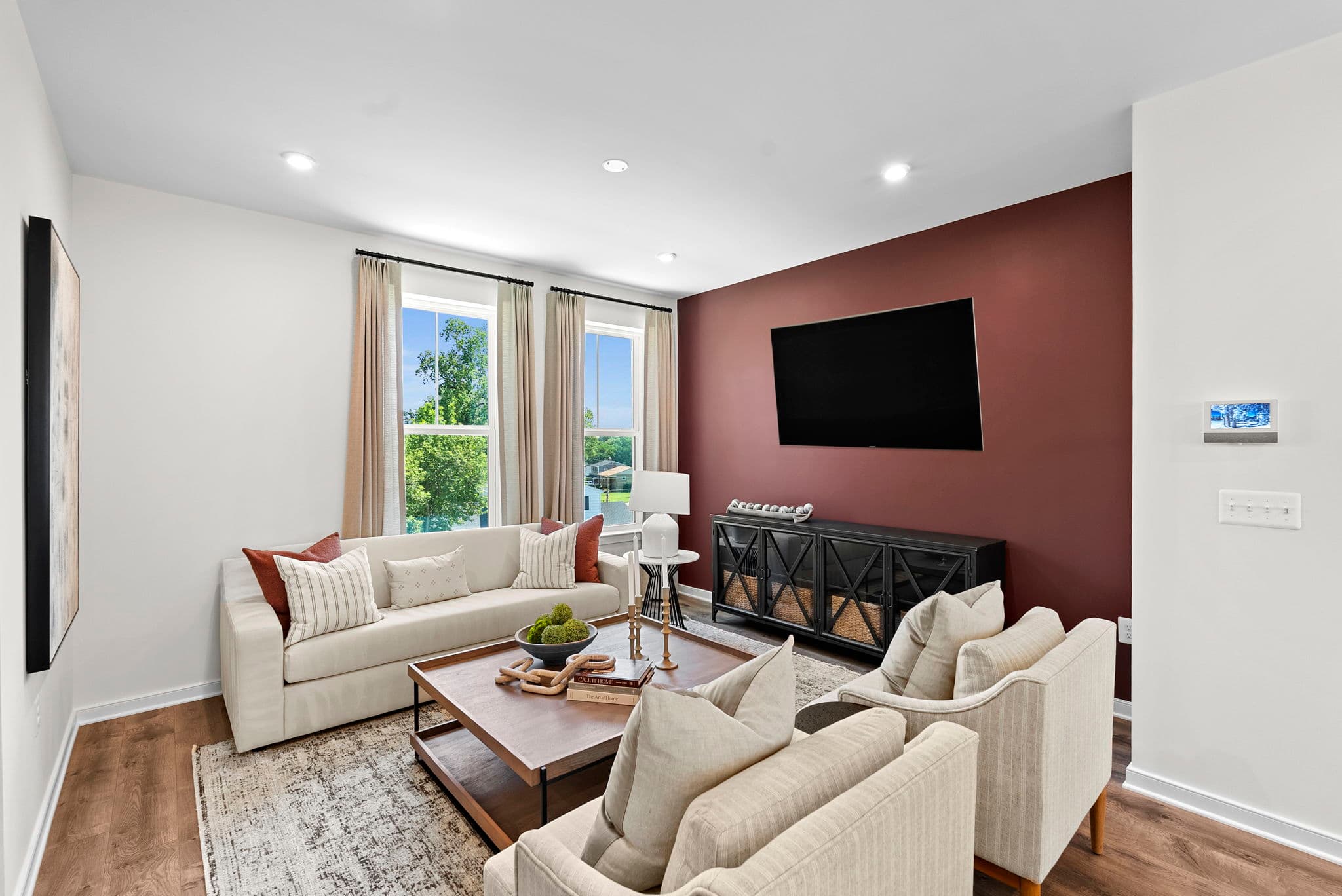 great room with solid flooring & lots of light