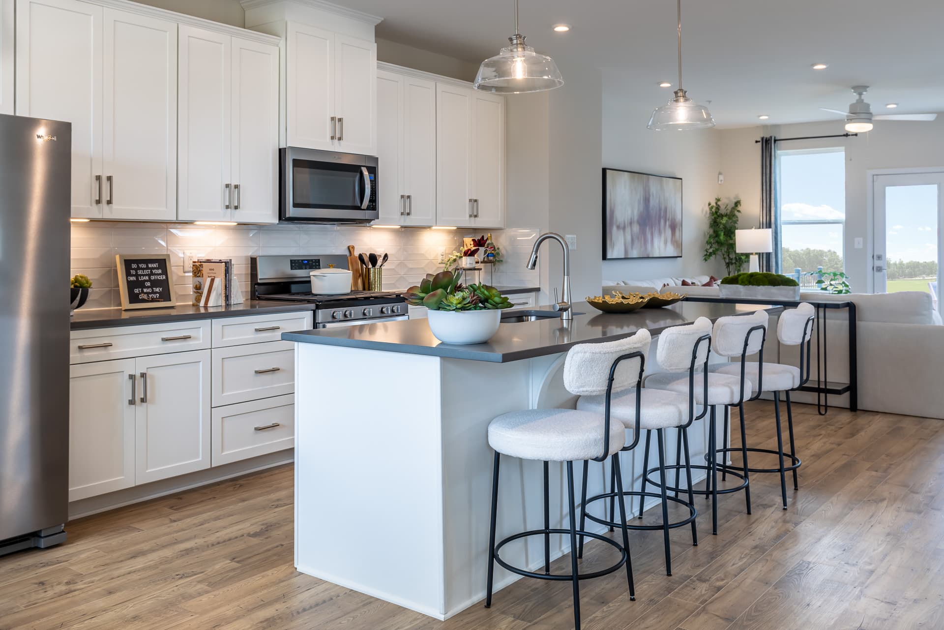 kitchen with hardwood floors and large island