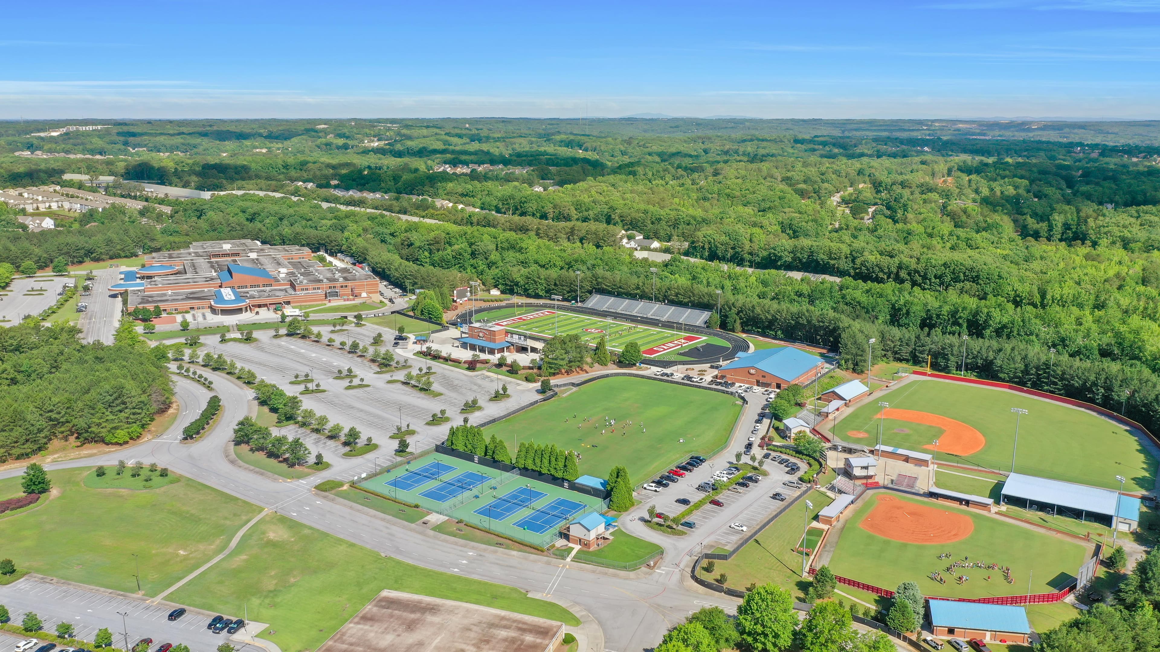 aerial view of mill creek high school and sports fields