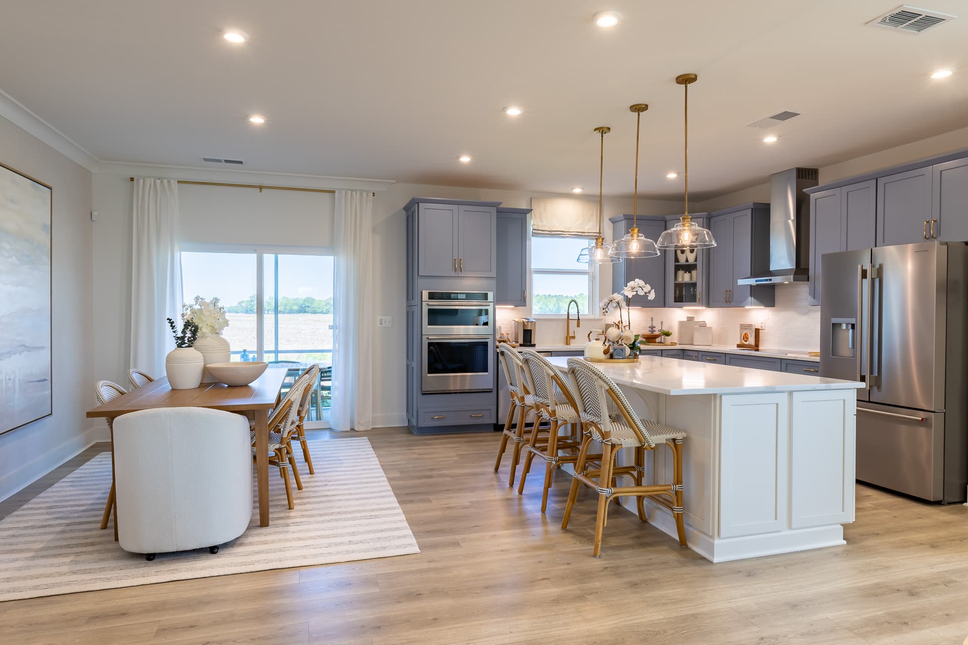 kitchen with a center island connecting to the breakfast area