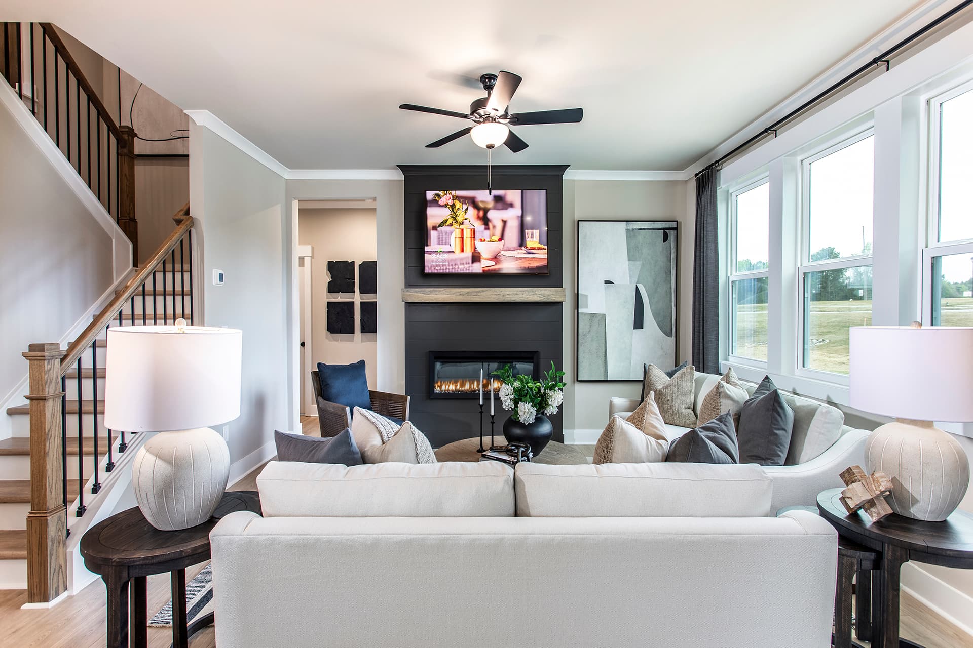 great room with electric fireplace and hard surface flooring