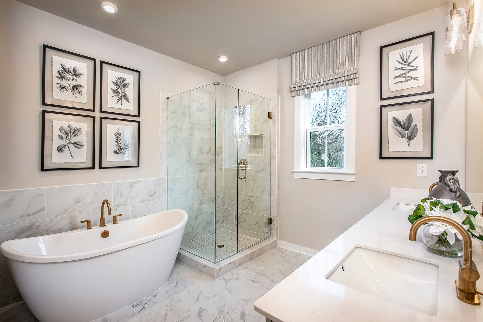 primary bathroom with free-standing tub and separate shower