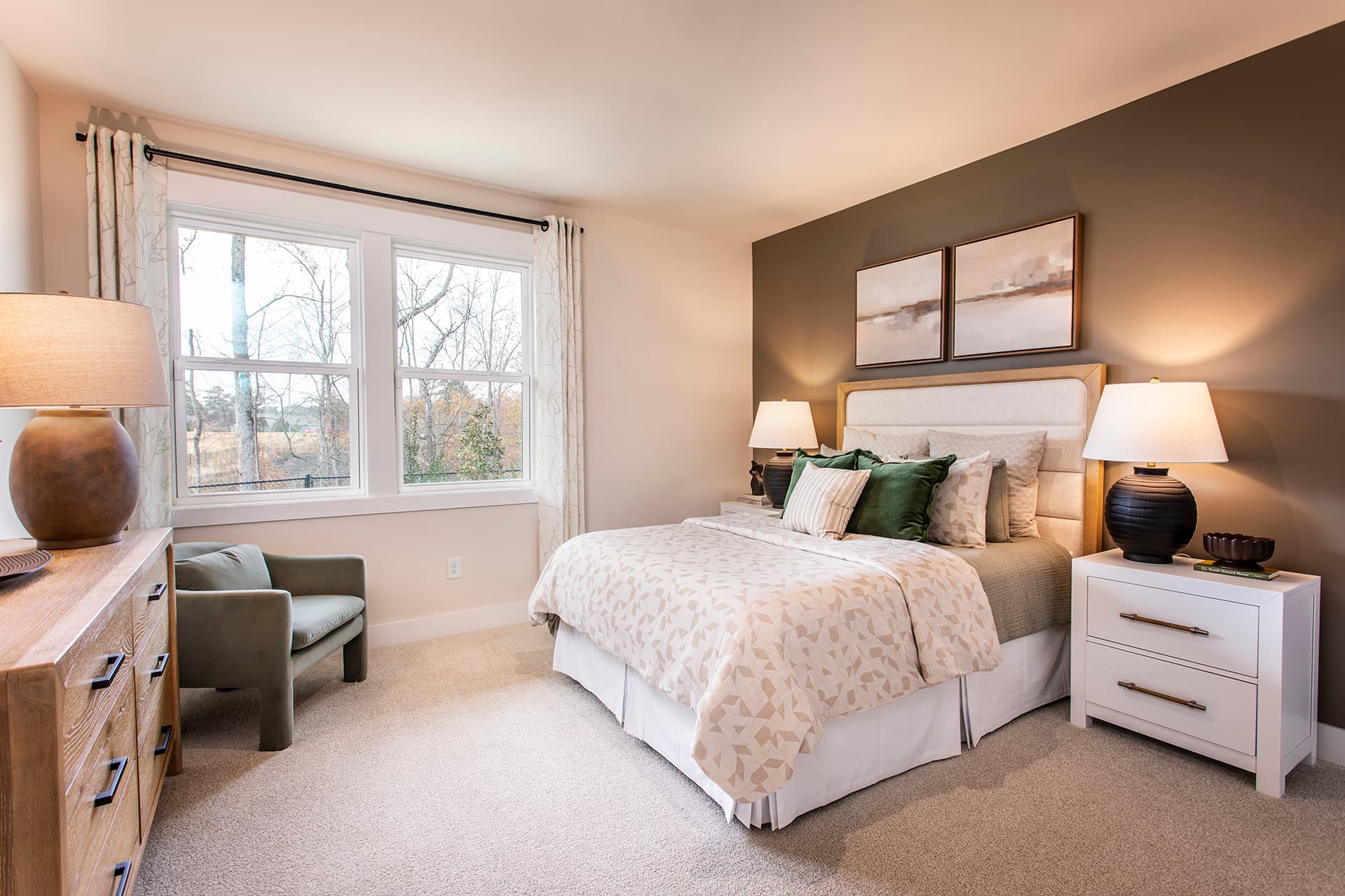 secondary bedroom with windows and carpet